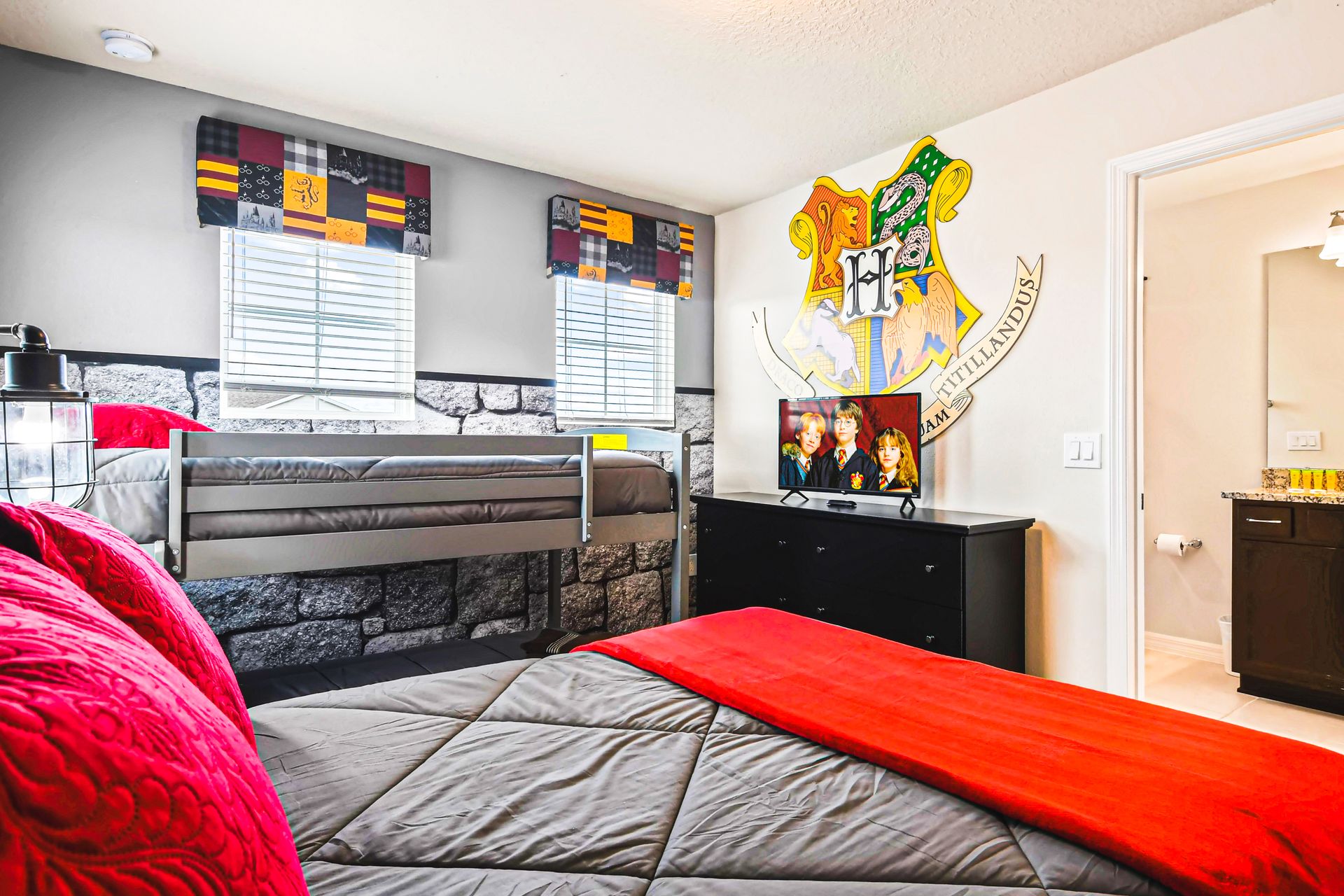 Unwind in our Harry Potter themed room with three beds, providing you with a peaceful retreat and a restful night's sleep during your stay.