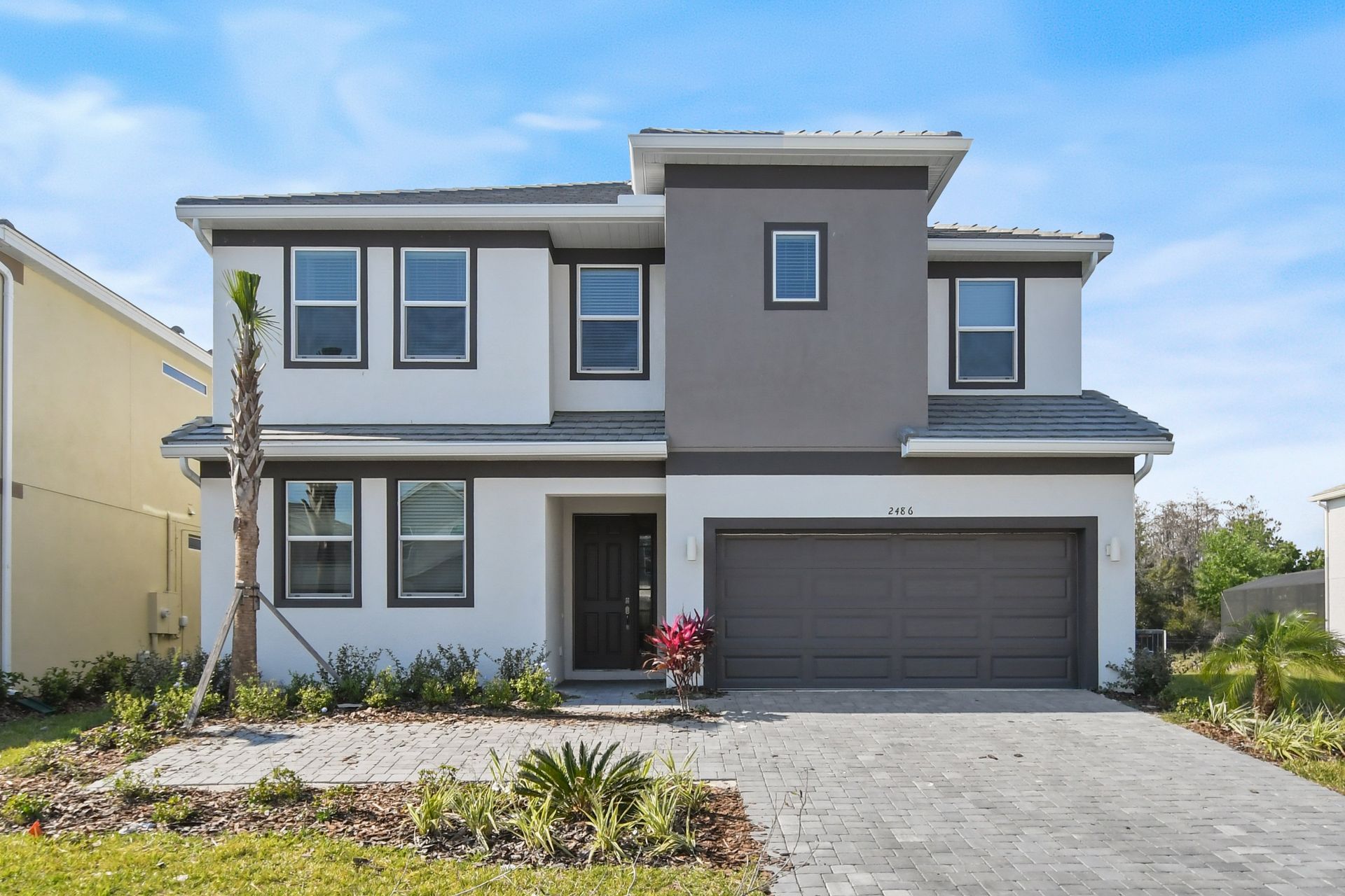 Modern two-story retreat with private pool, game rooms, and family-friendly charm.
