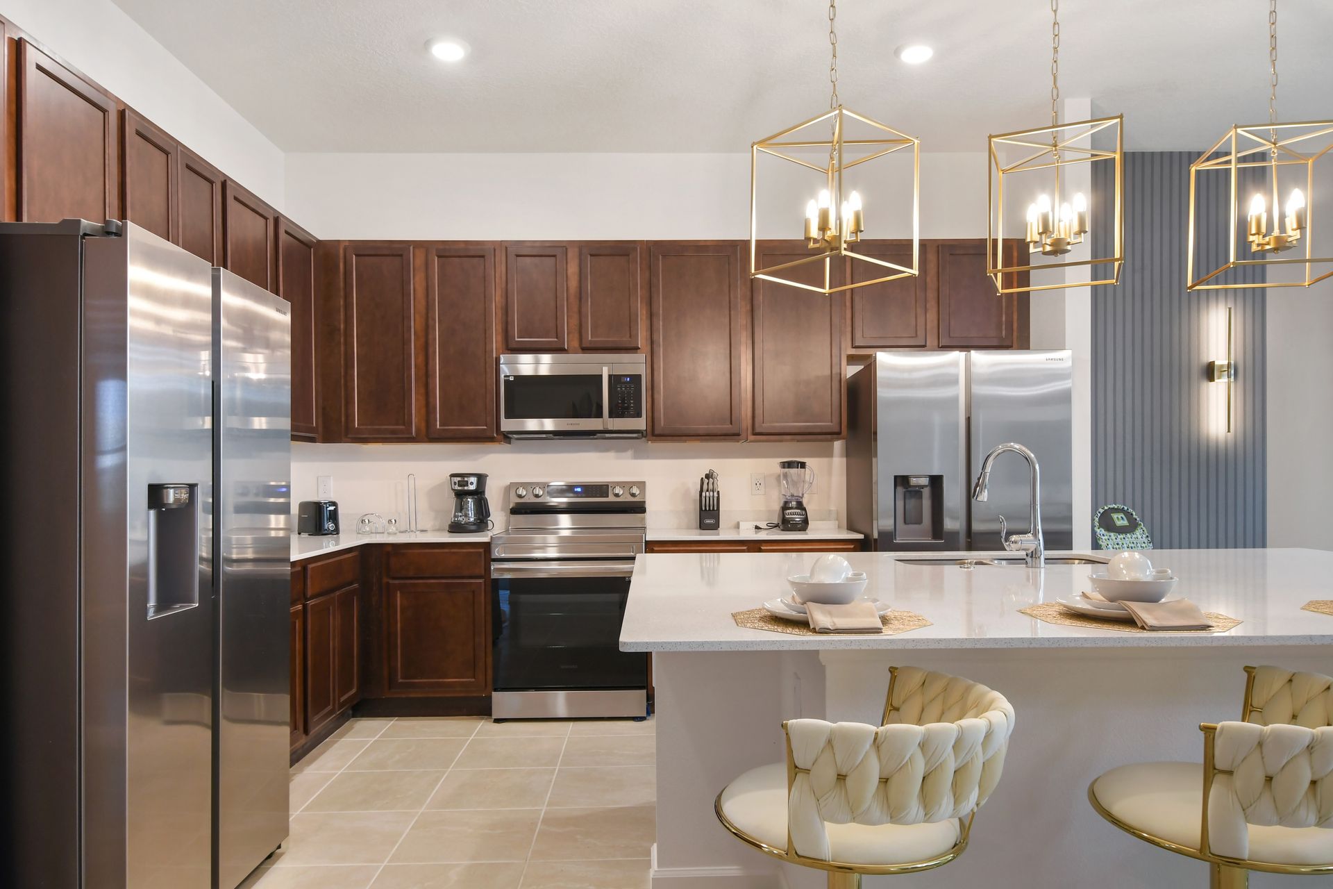 Cook up delicious meals in this fully equipped kitchen, complete with stainless steel appliances and ample counter space.