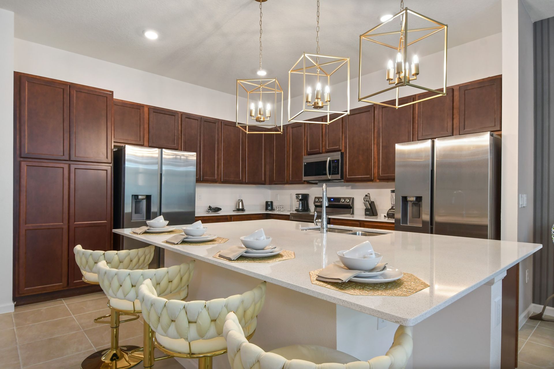 Start your day with coffee and breakfast at this inviting bar with comfortable seating and stunning pendant lighting.