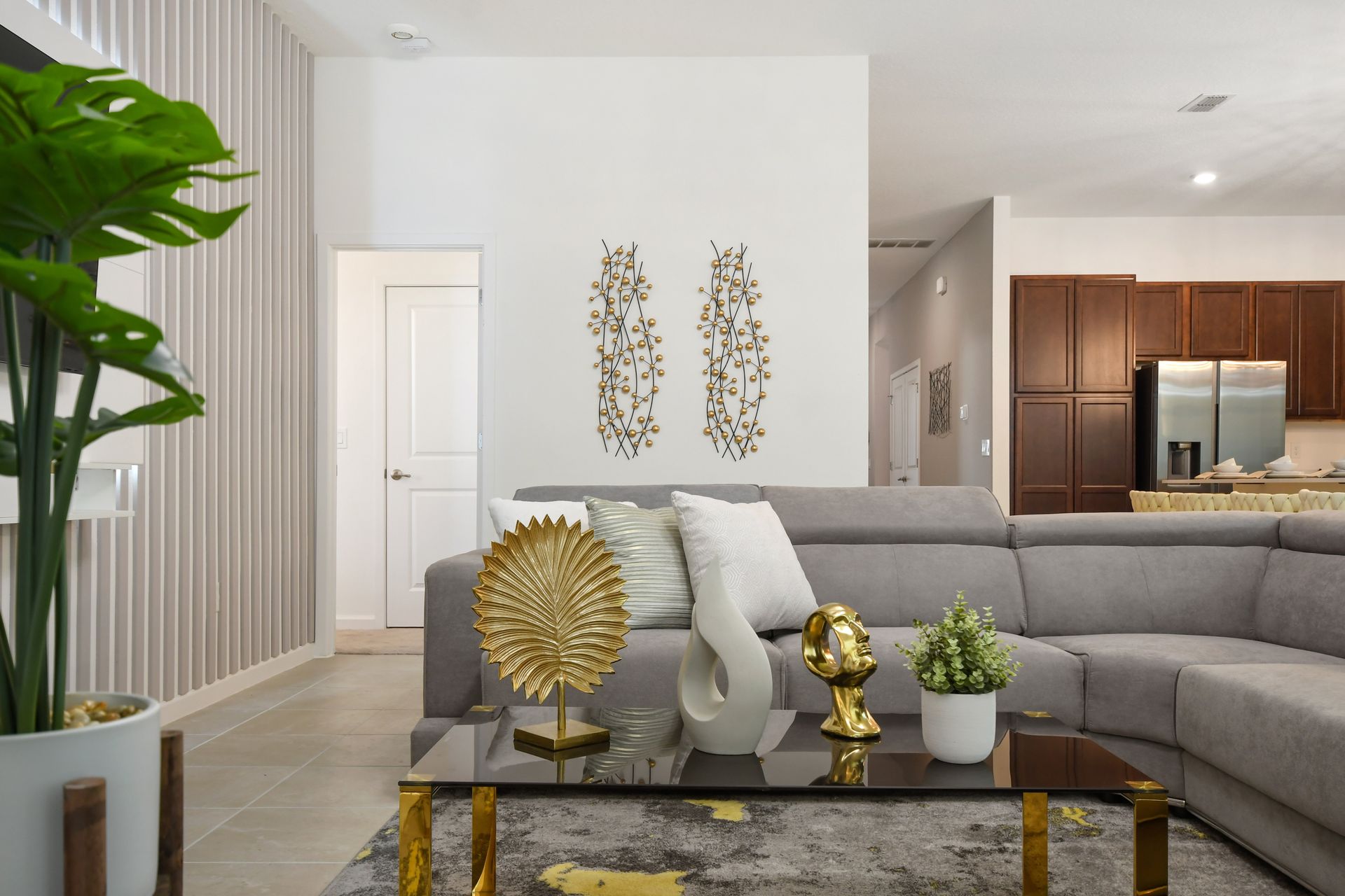 Spacious modern retreat with chic decor, cozy seating, and elegant lighting.
