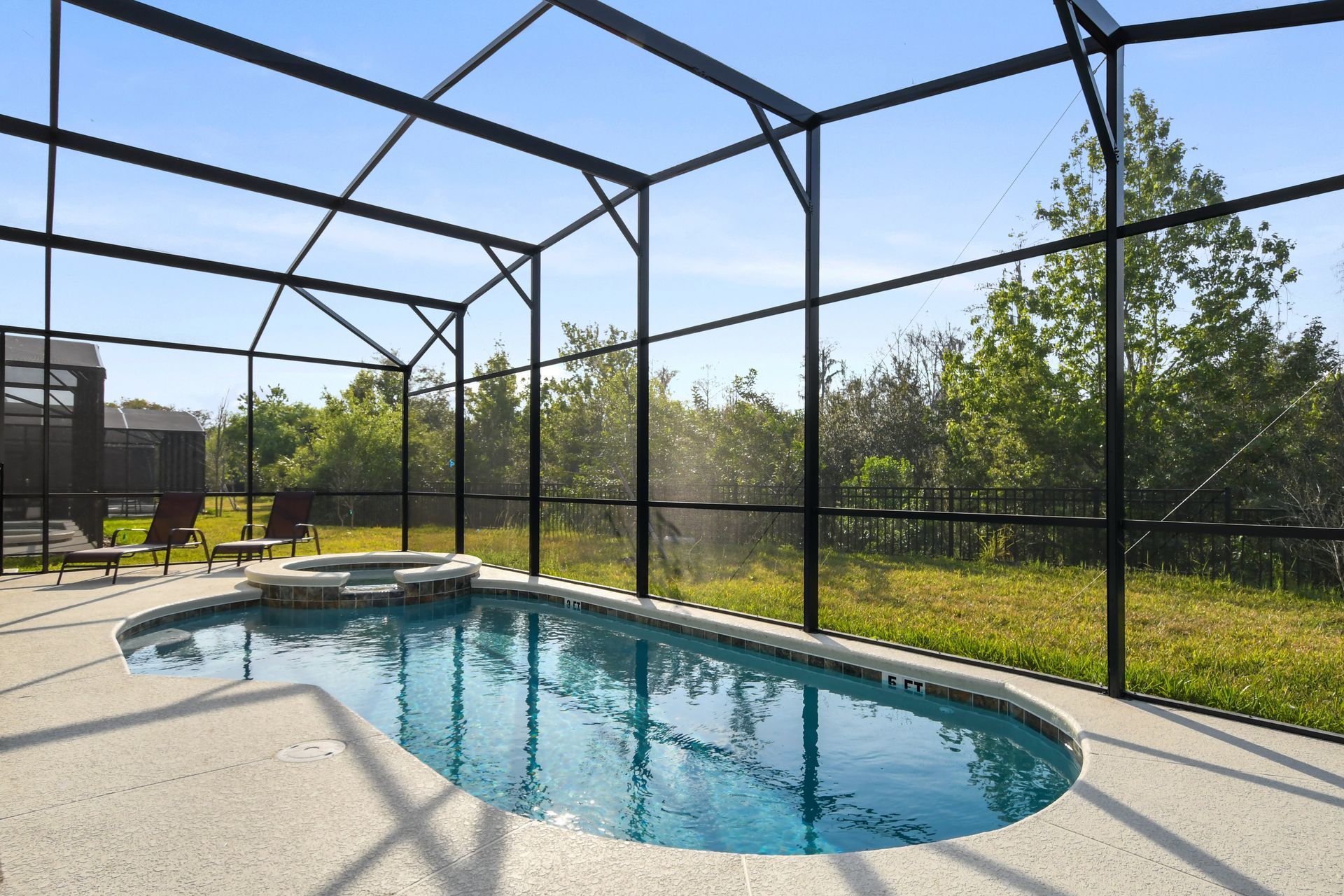 Enjoy a relaxing swim or unwind in the private jacuzzi, surrounded by lush greenery and serene views.