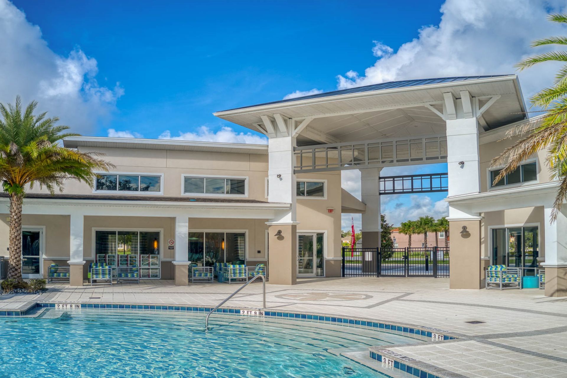 Luxury resort-style getaway with a pool, palm trees, and modern amenities!