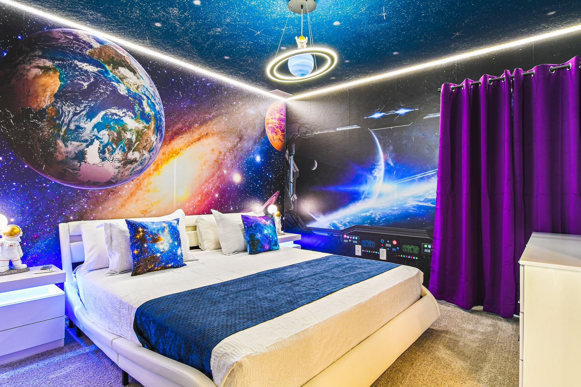 The spacious king bedroom on the second level with a Smart TV.