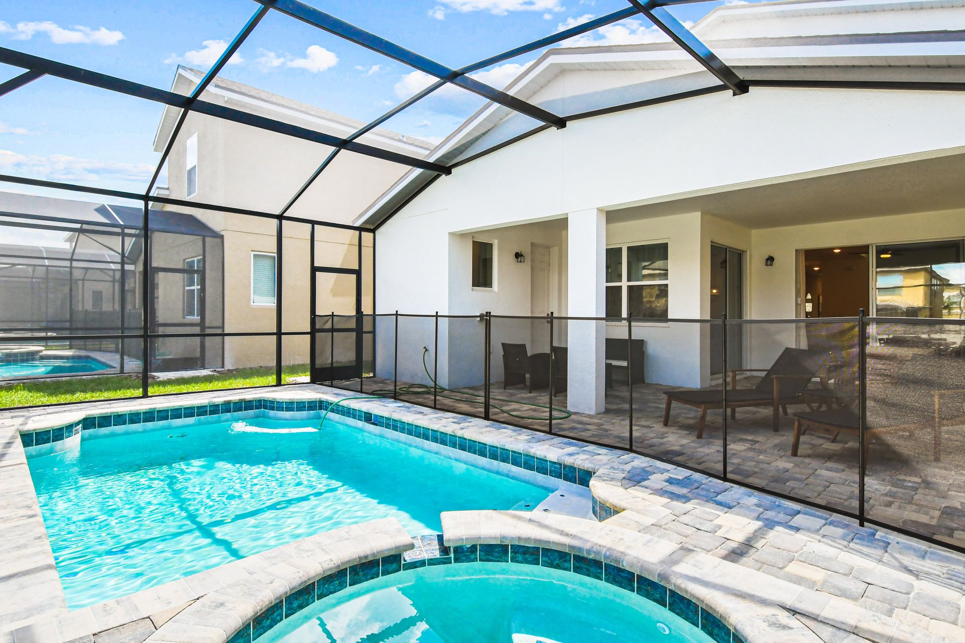 Relax in your private screened pool and spa, perfect for sunny days and nights.