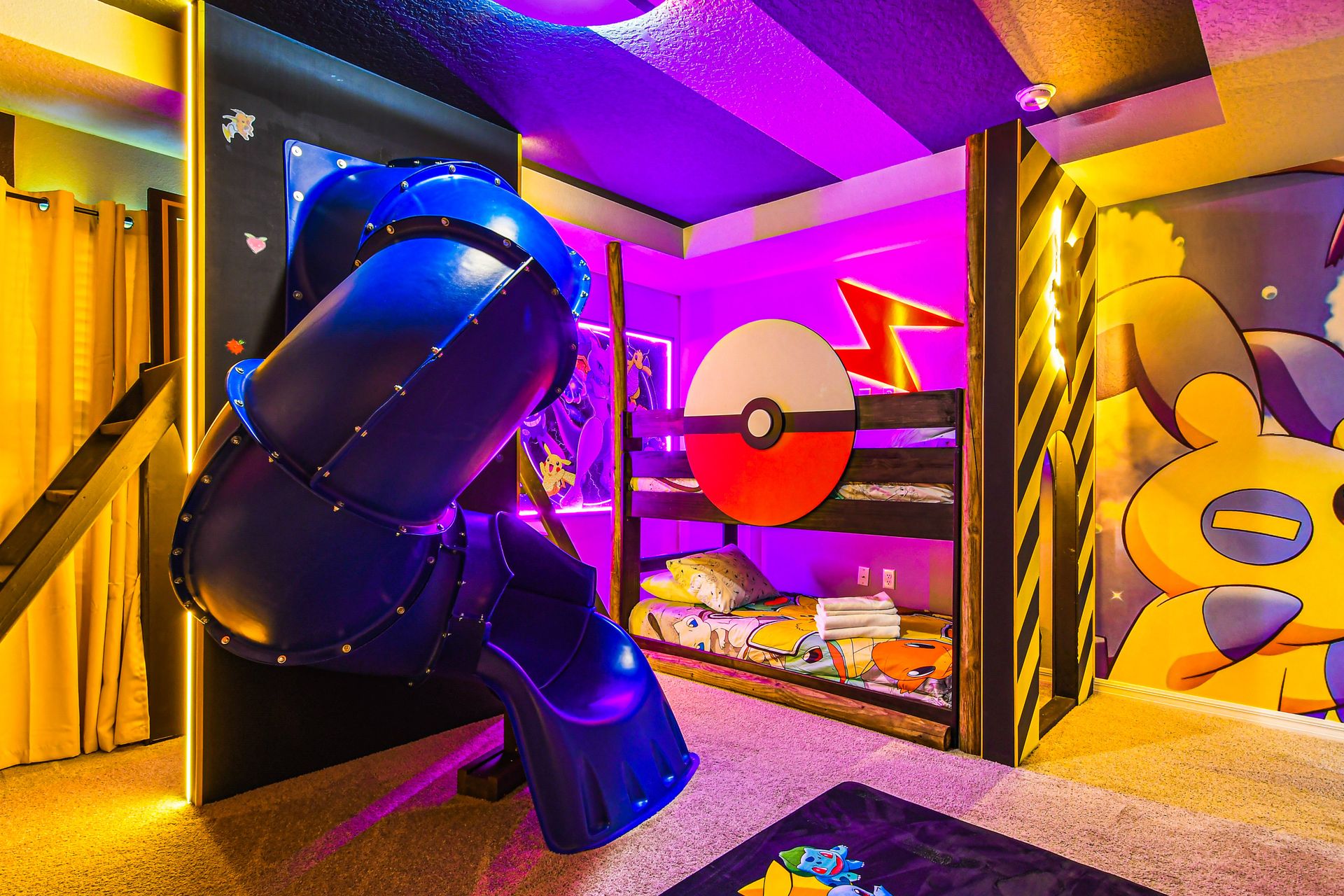 Vibrant Pokémon-themed room with bunk beds, slide, and immersive decor.