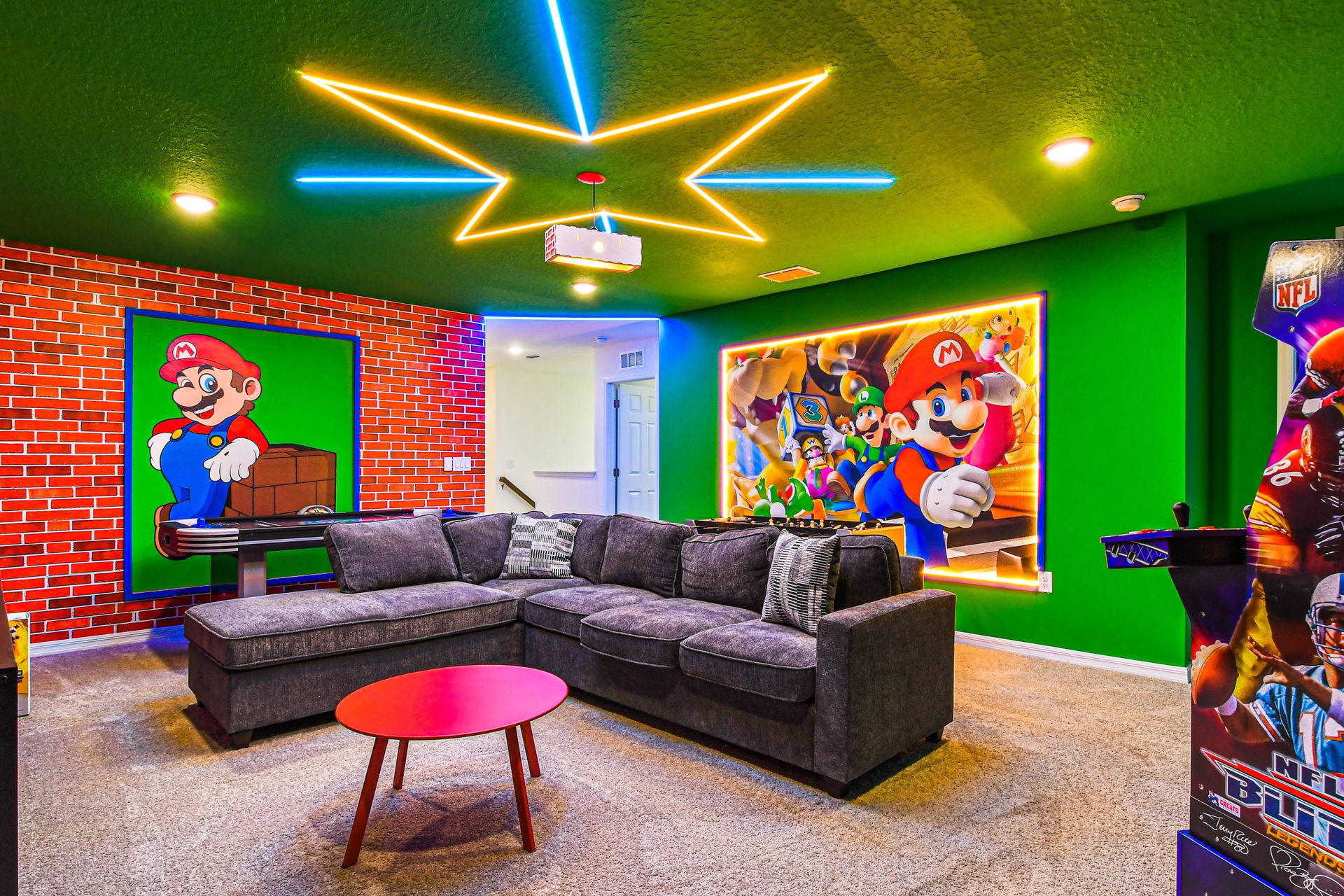 Mario-themed game room with arcade, cozy seating, and vibrant lighting.