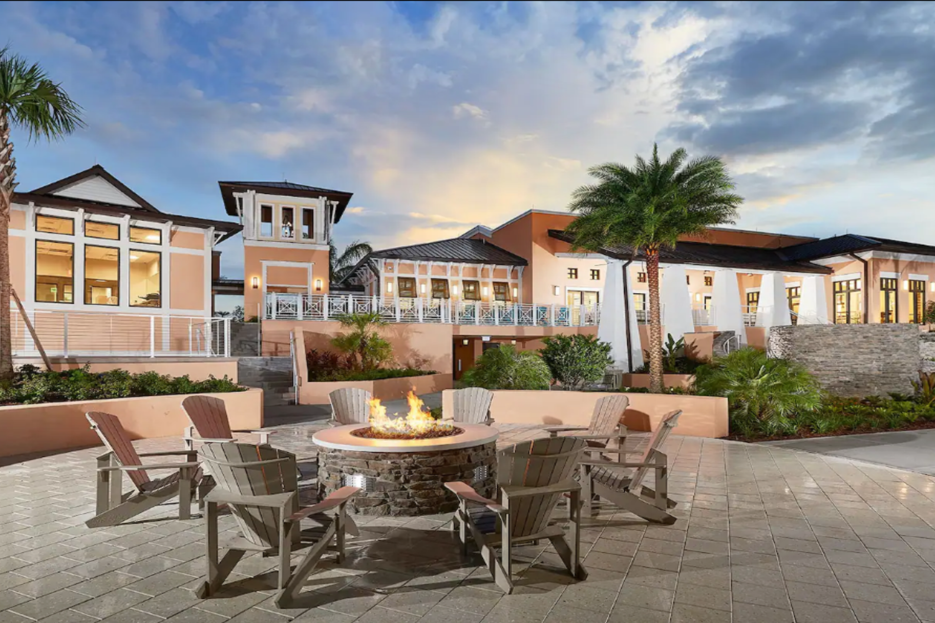 Luxury resort vibes! Unwind by the fire pit in this stunning tropical escape.