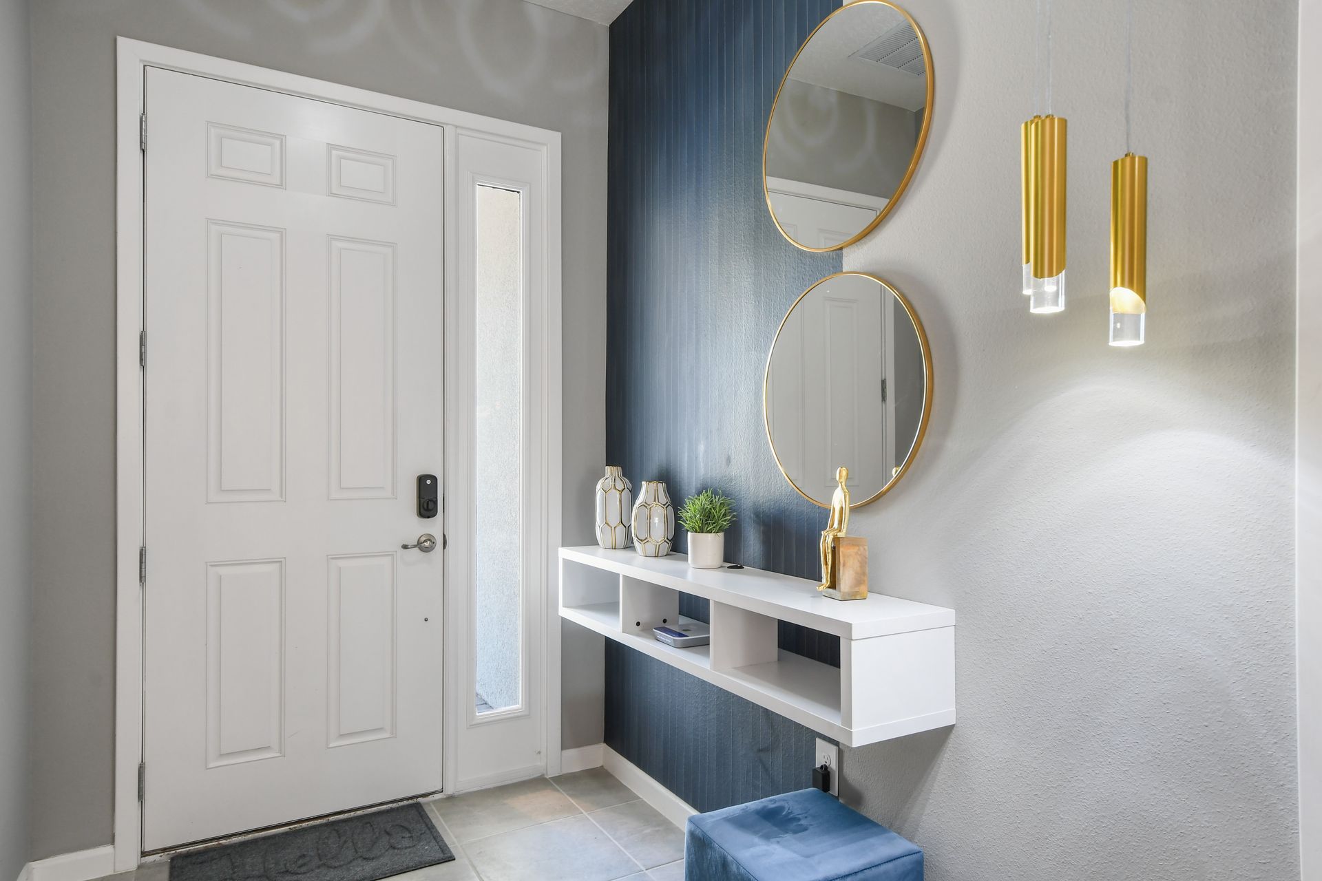 Bright and simple bathroom with natural light and a clean white vanity.