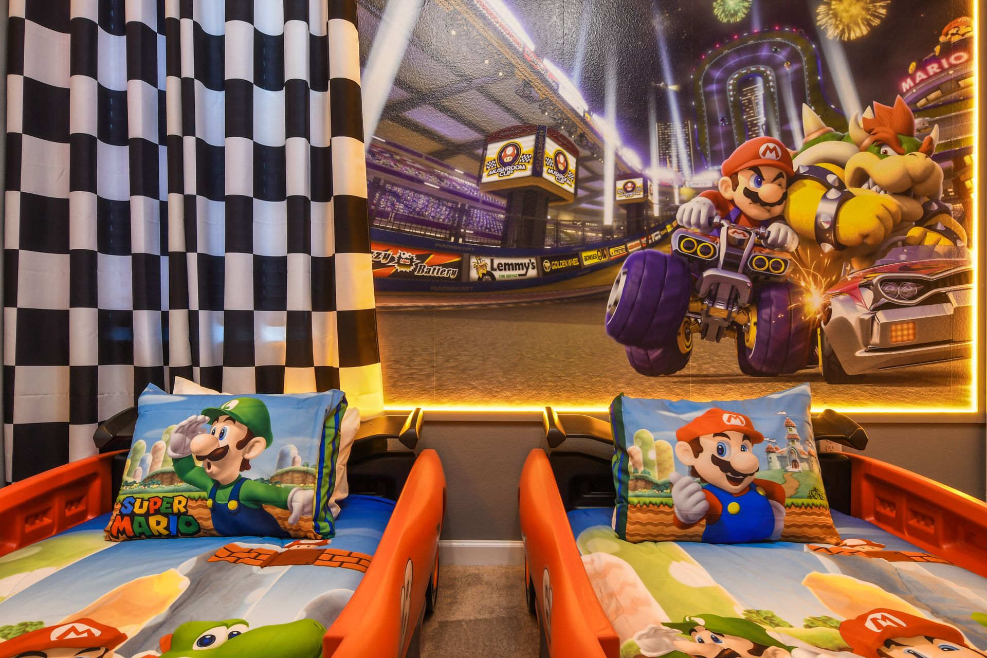 Get ready to zoom into fun in our Race Car Room. This dynamic space features race car beds for children.