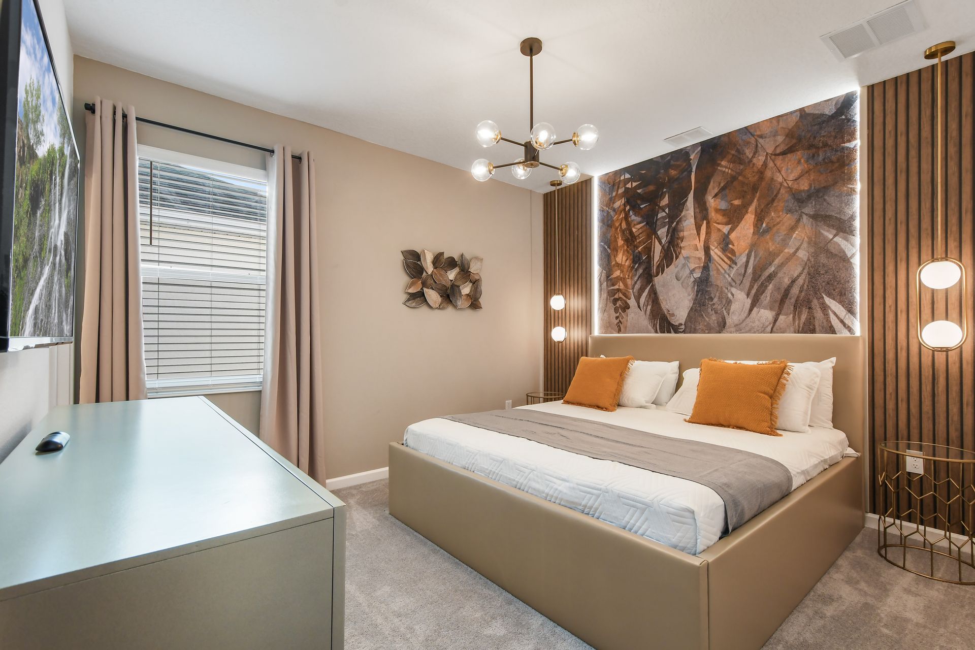 Warm bedroom with nature-inspired decor, modern lighting, and cozy accents.