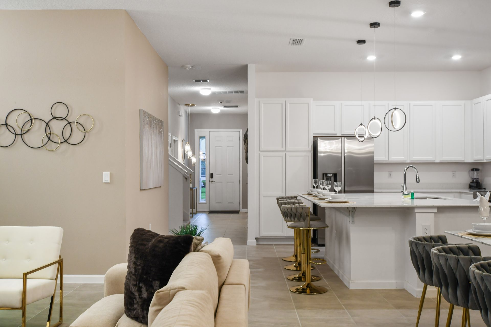 Chic kitchen with luxe finishes, sleek seating, and a welcoming open layout
