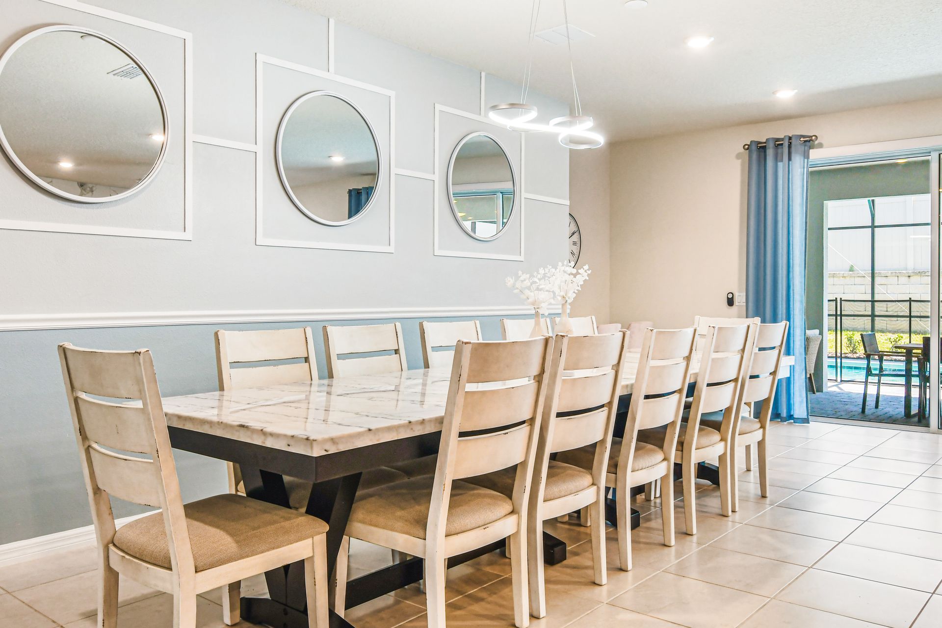 Spacious dining area with poolside views