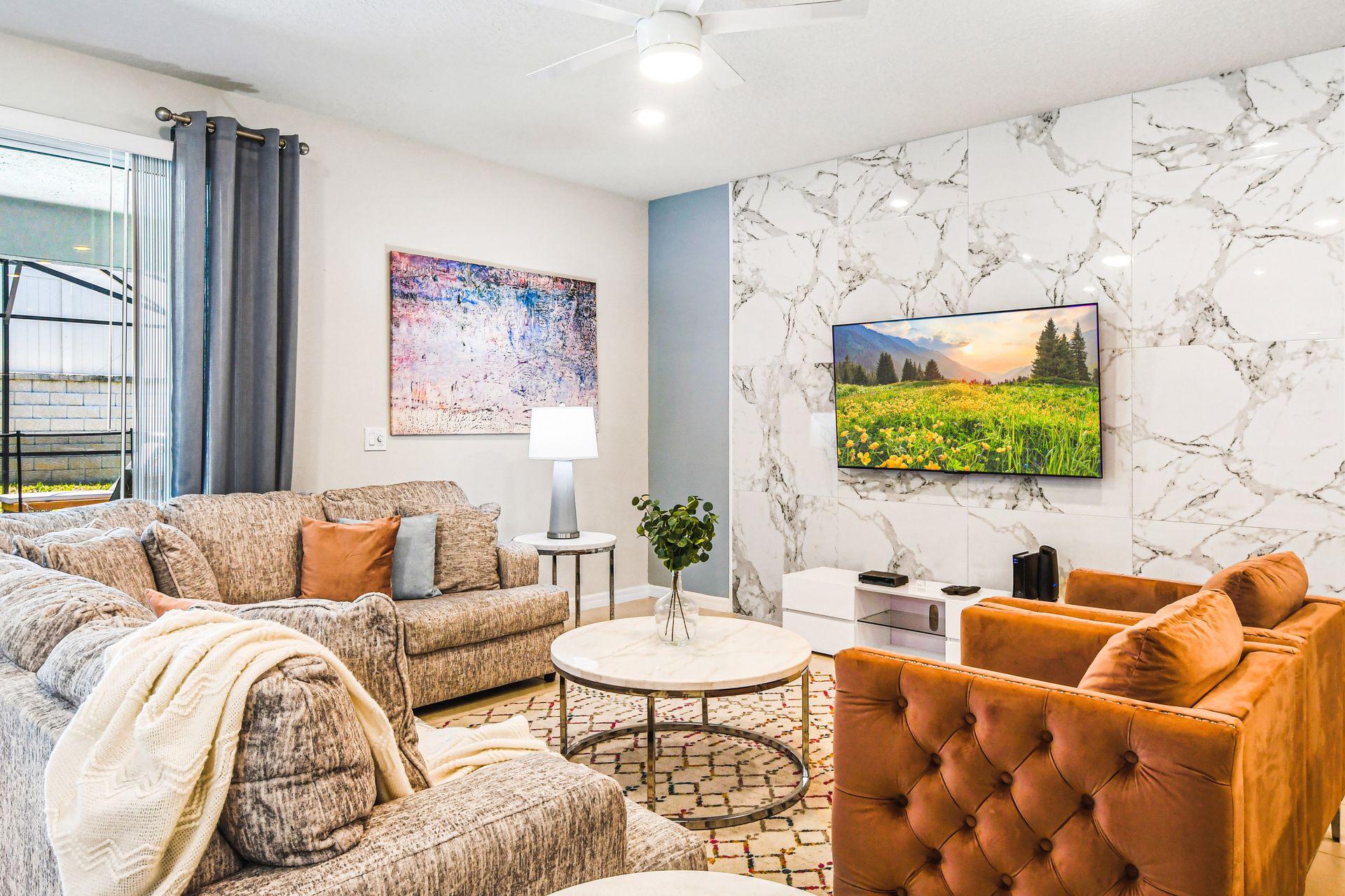 Cozy living space with modern decor, marble accents, and views