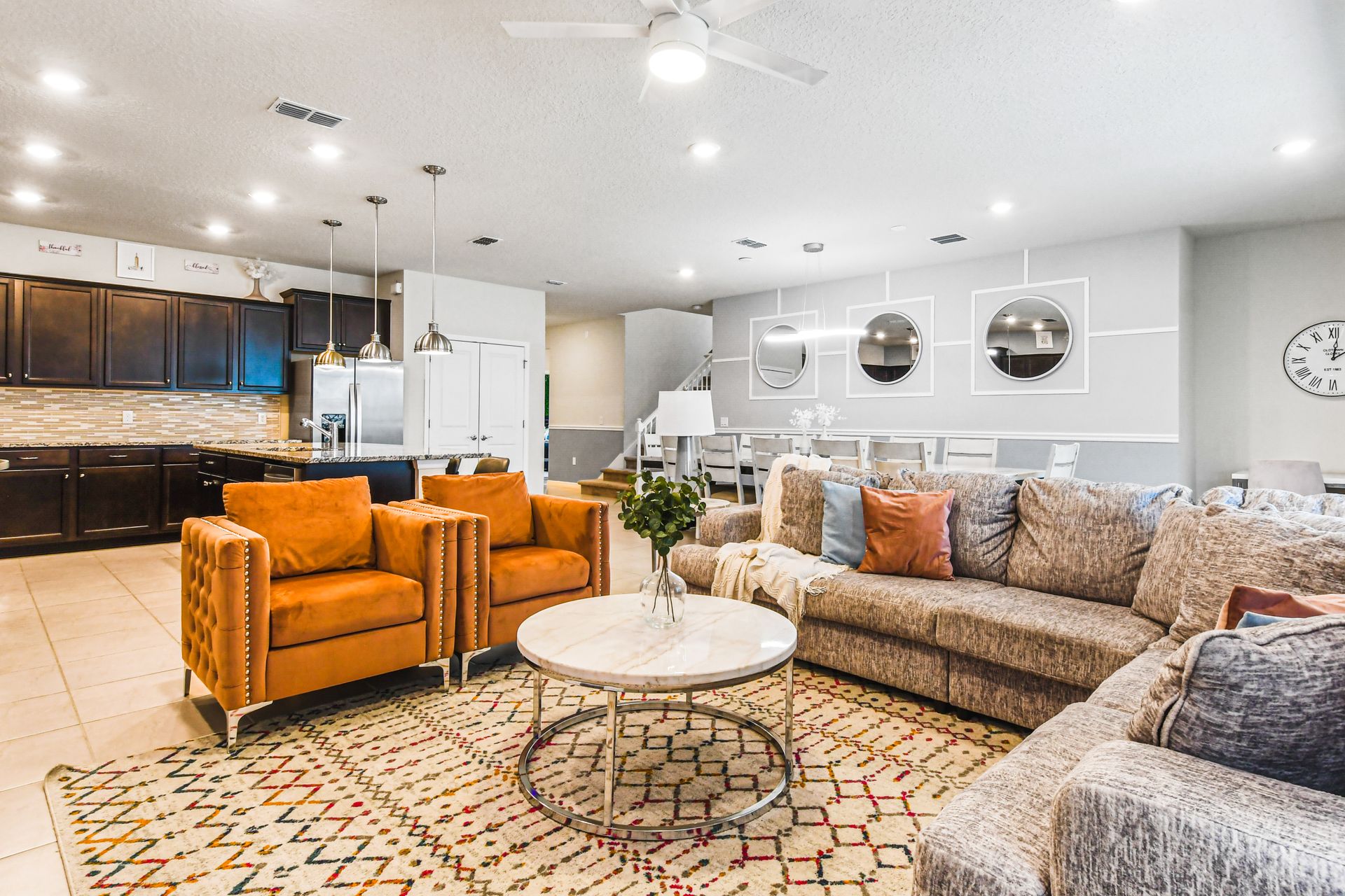 Open-concept living and kitchen area with stylish and cozy design