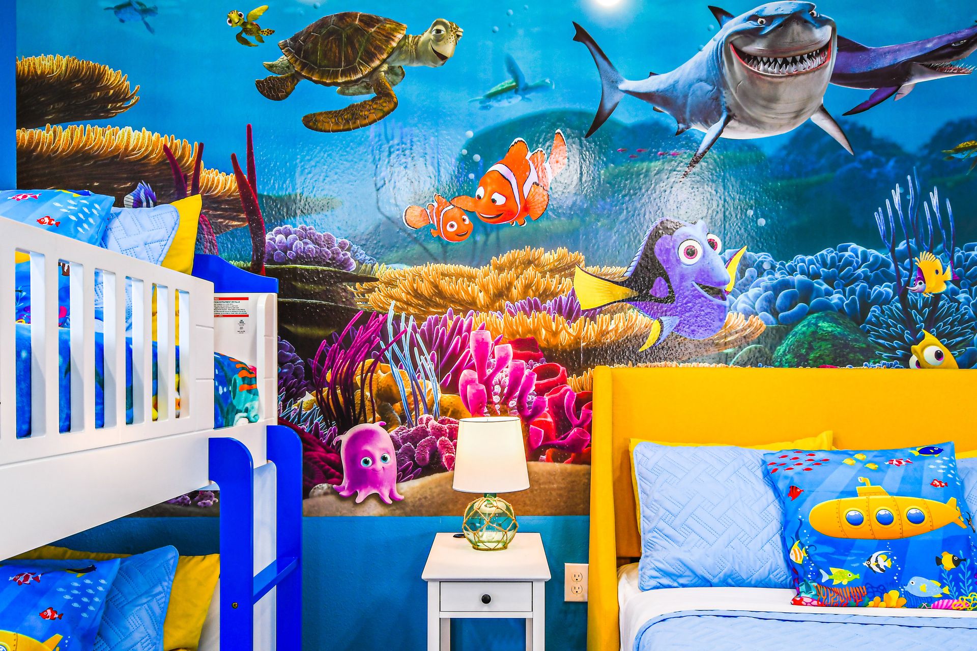 Bright underwater-themed bedroom featuring fun ocean characters