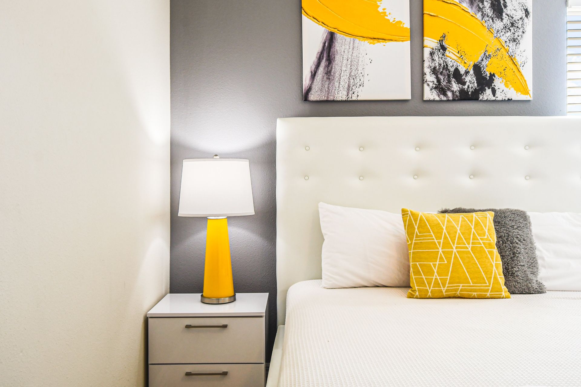 Bright and modern bedroom with stylish decor and cozy vibes.