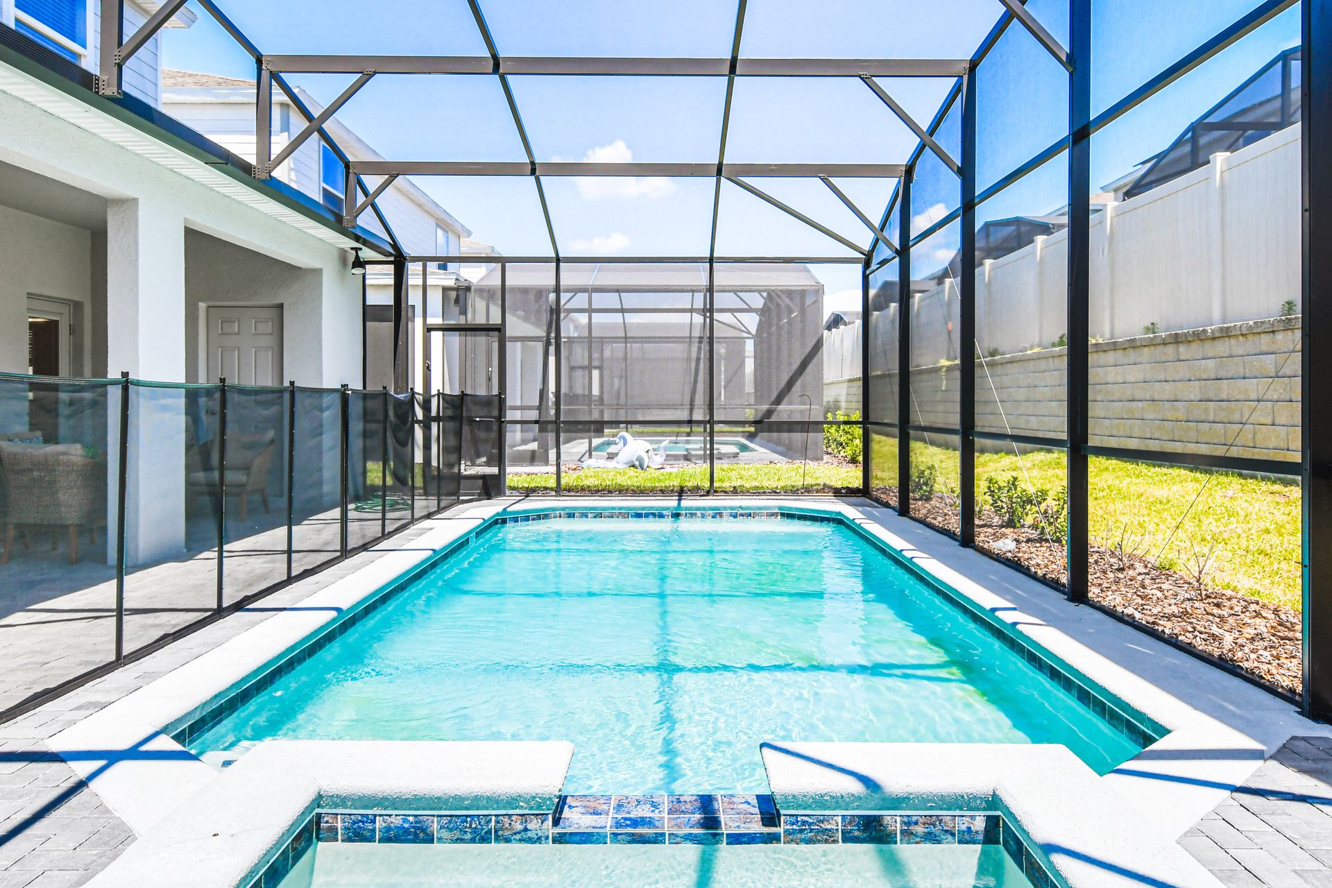 Dive into your private pool, complete with a safety fence.