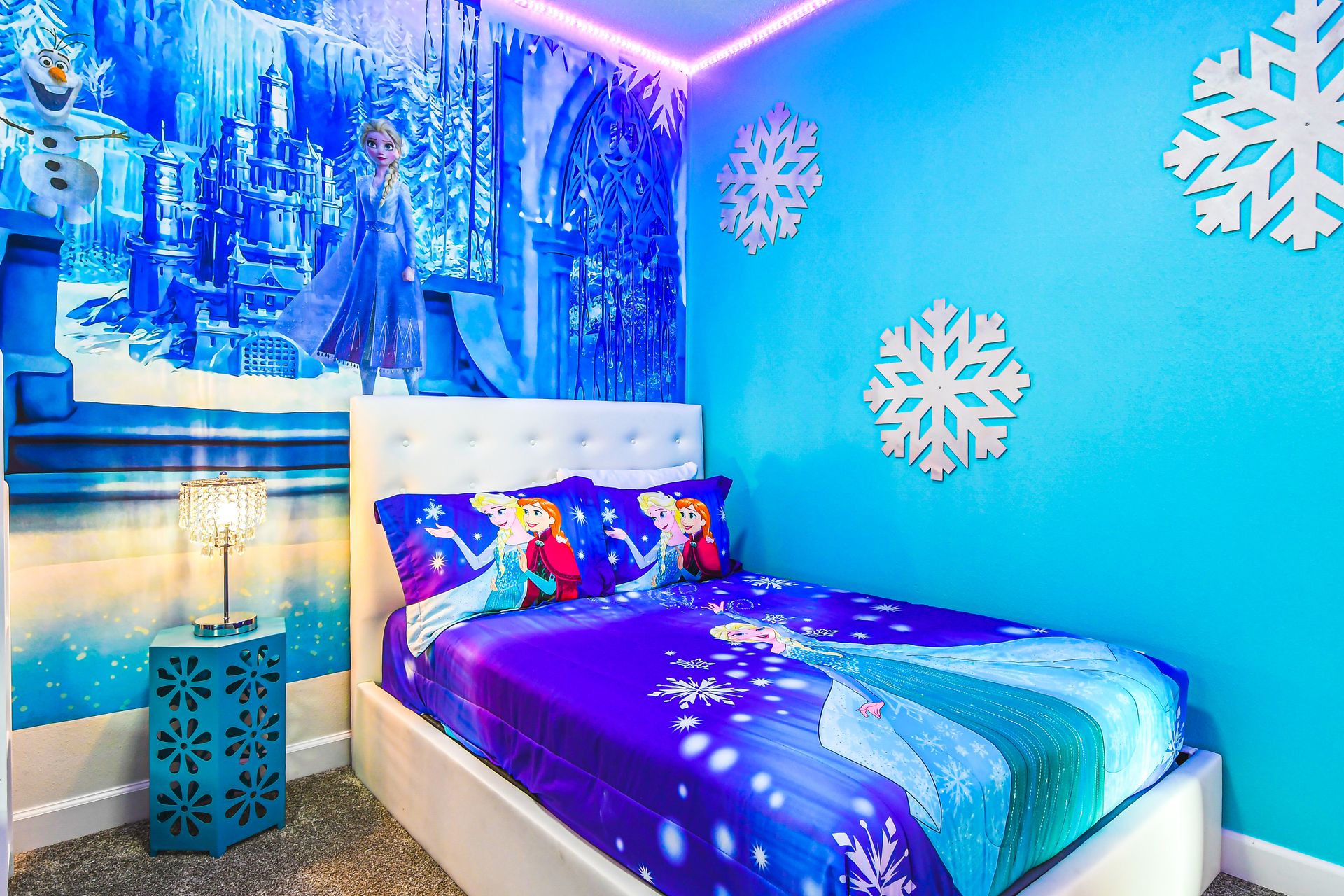 Unwind with the little ones in our inviting Elsa Themed bedroom, offering you a restful stay during your time here.
