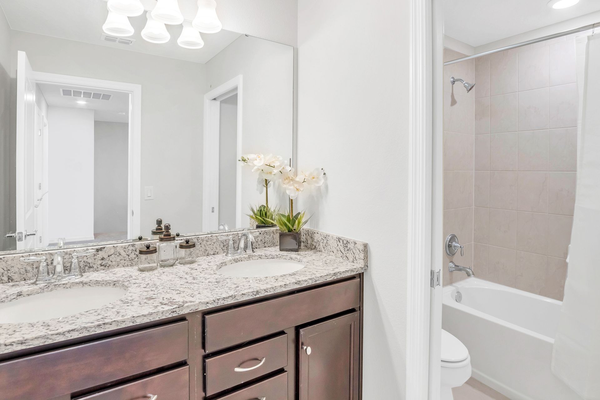 Indulge in luxury in our well-appointed bathroom, providing you with all the amenities you need for a comfortable stay.