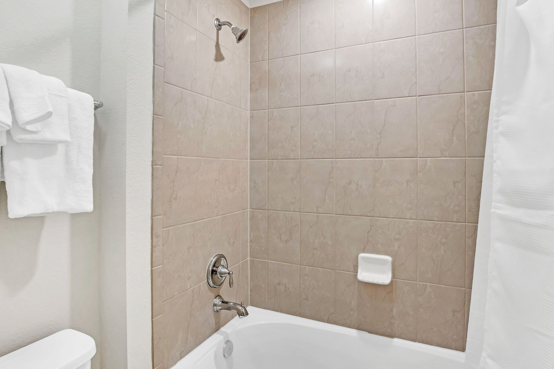 Refresh and rejuvenate in our modern bathroom, offering you a spa-like experience during your stay.