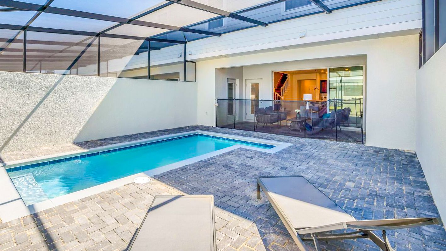 Enjoy stunning views out on to the green field from your own private pool