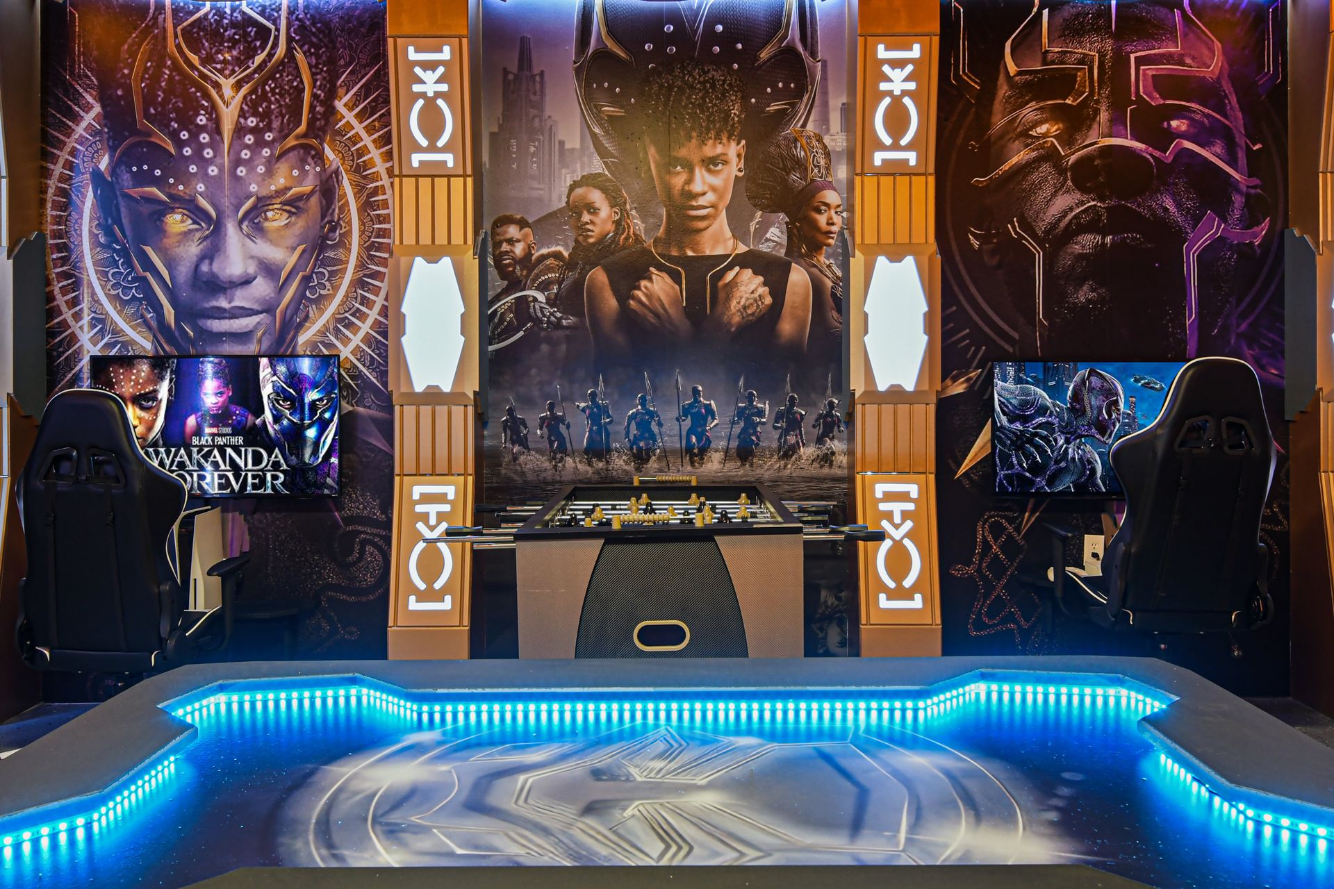 Step into Wakanda with dual gaming stations, foosball, and immersive decor.