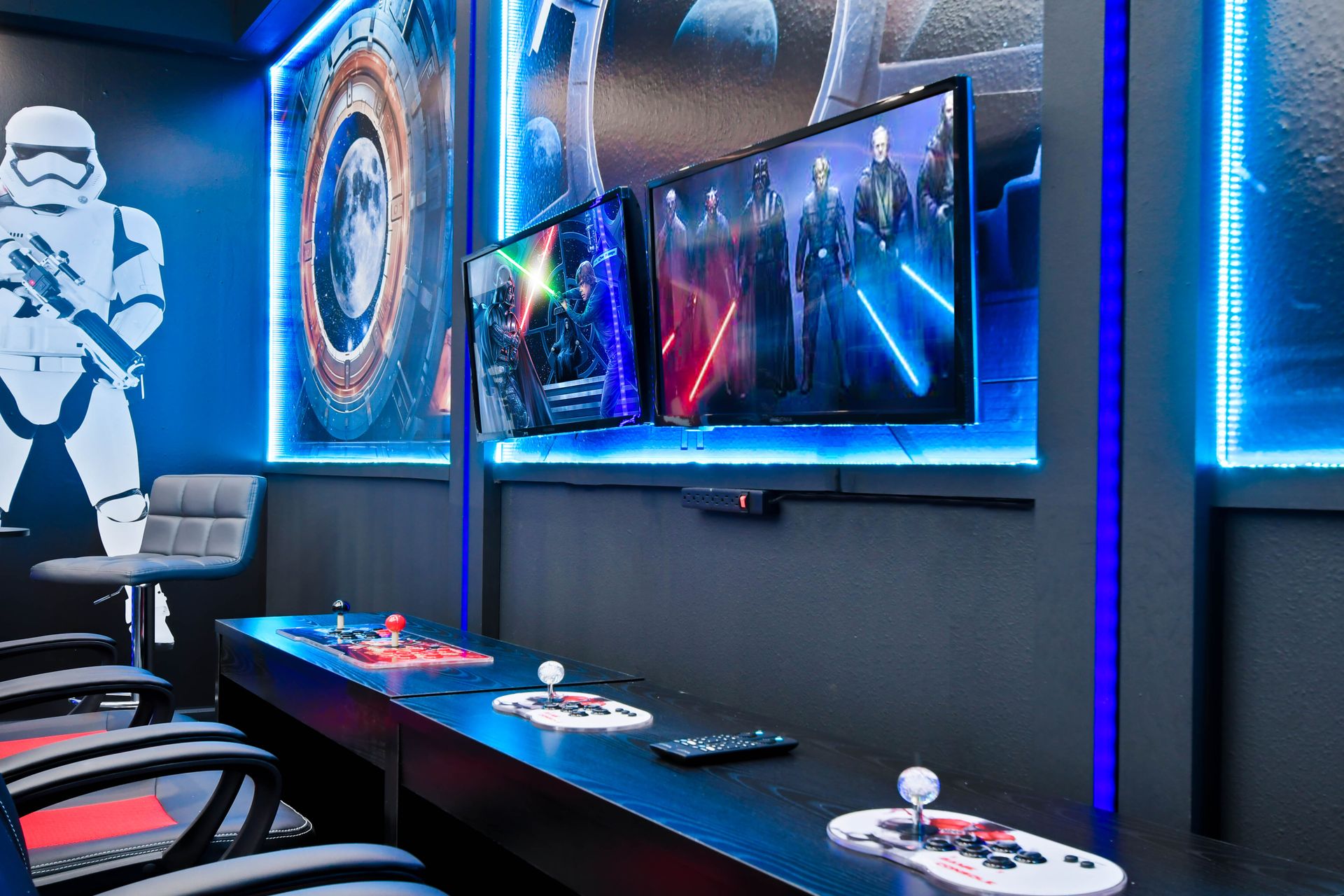 Superhero-themed billiards room with bold wall art, vibrant lighting, and fun vibes.