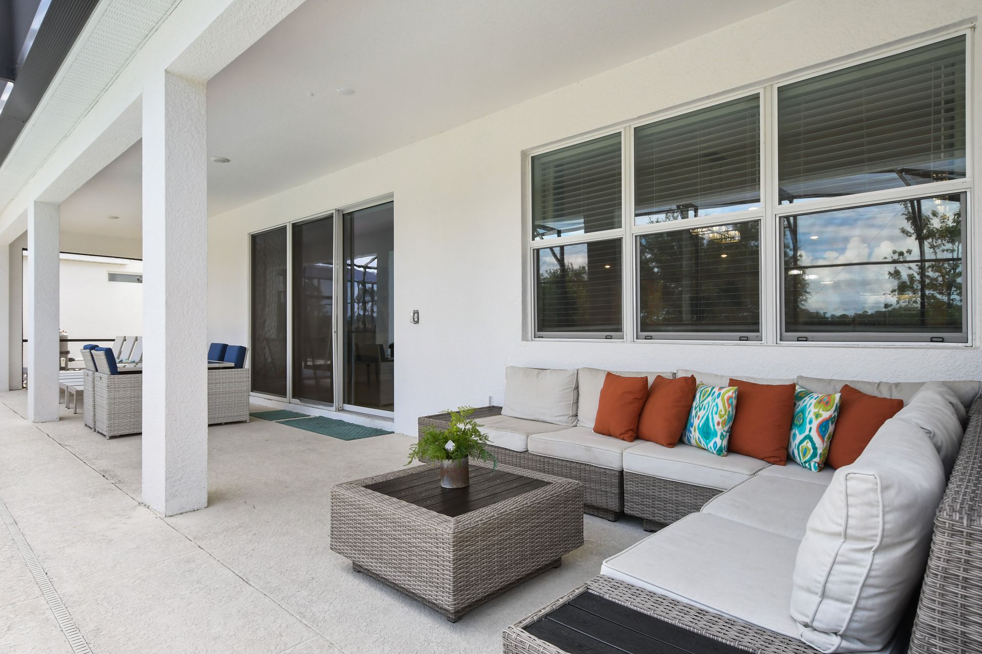 Unwind on the spacious patio with cozy seating, perfect for outdoor relaxation! 