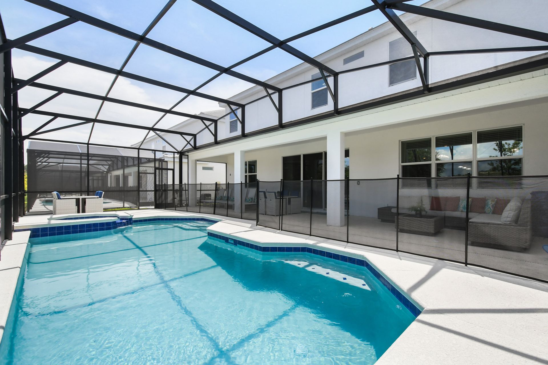 Relax in your private screened pool & spa with plenty of outdoor seating!