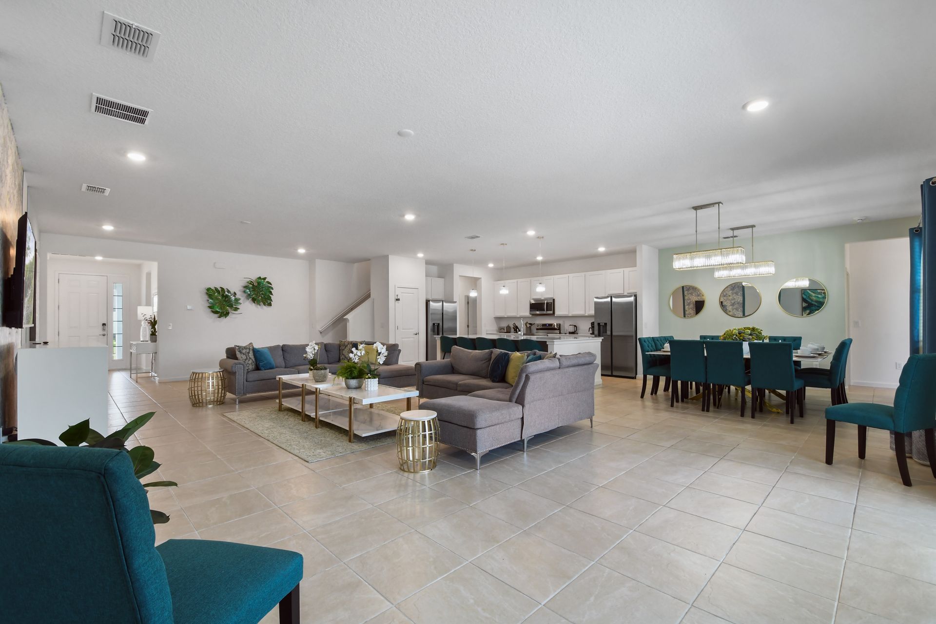 Spacious open-concept home with elegant décor, modern kitchen, and cozy seating!