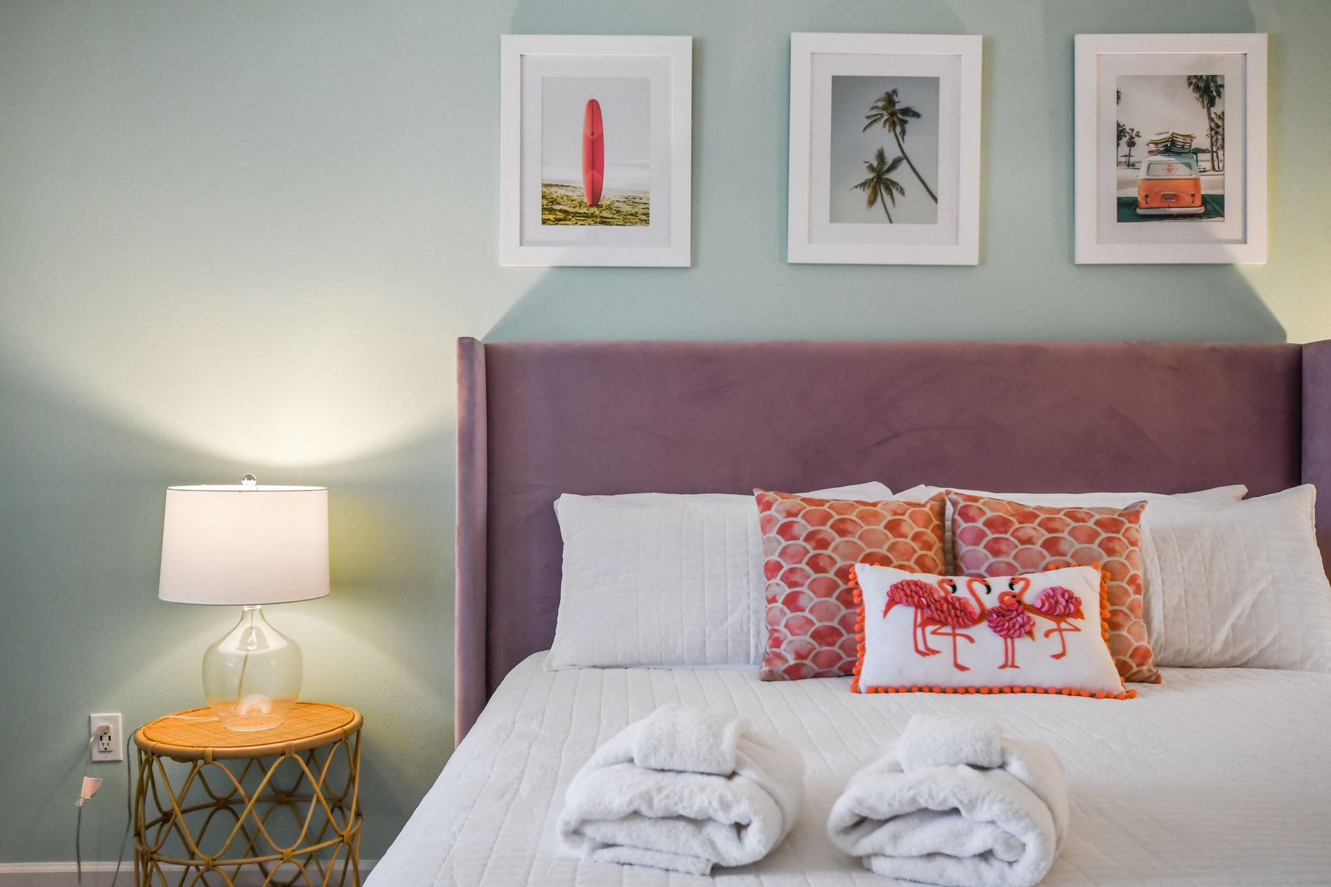 Cozy tropical retreat with a plush bed, vibrant décor, and relaxing beachy vibes!