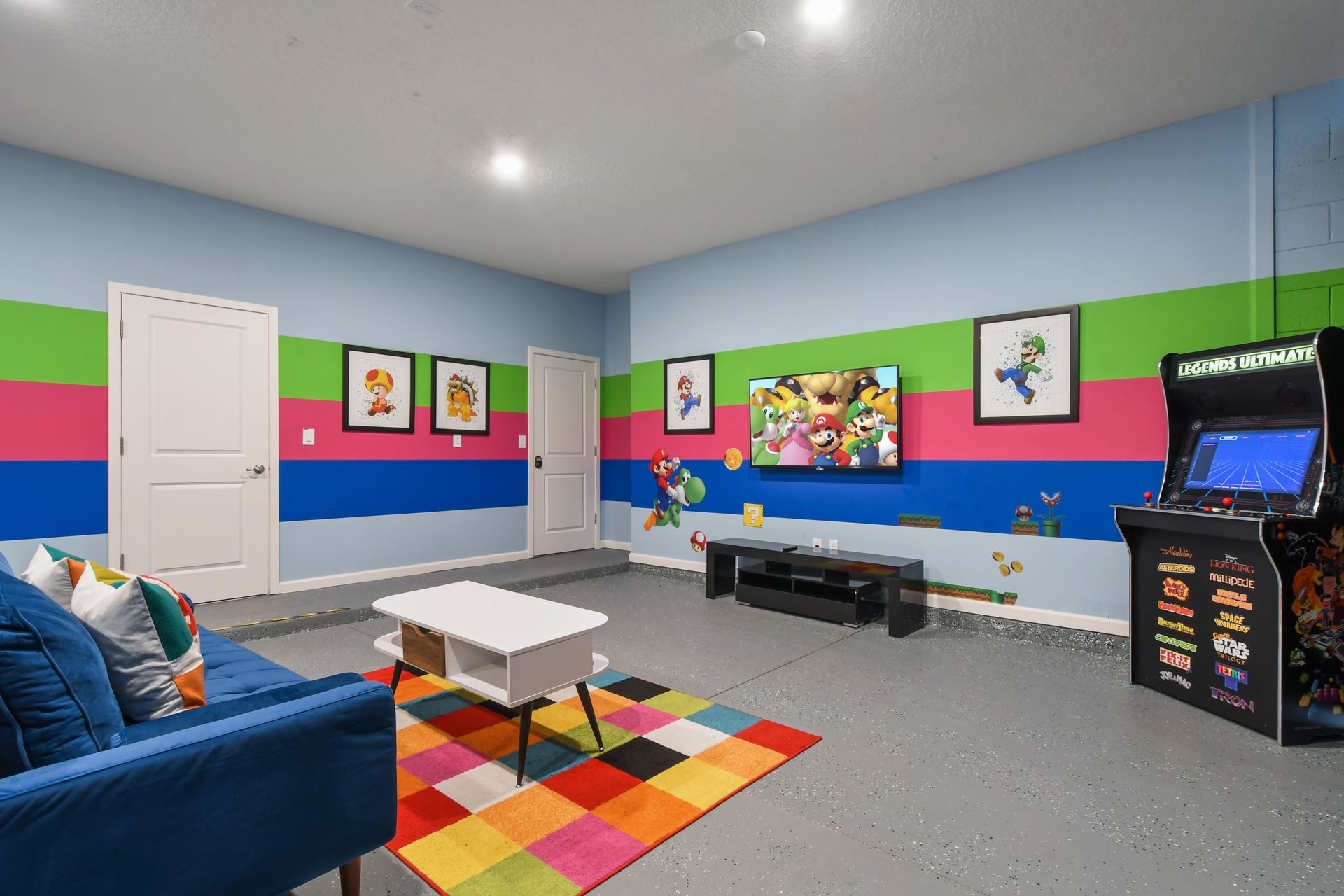 Exciting game room with arcade games, vibrant décor, and a fun Mario-themed vibe!