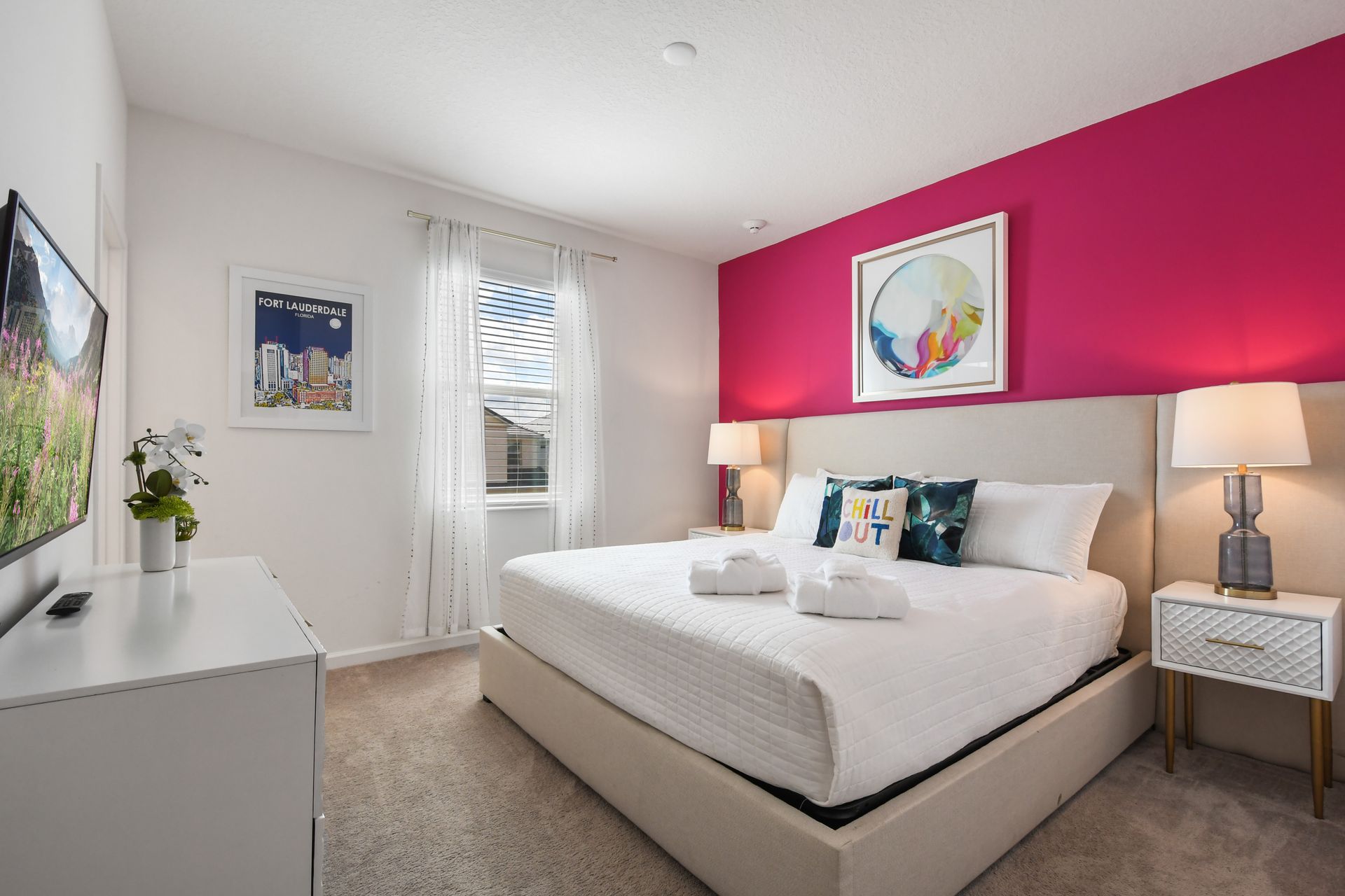 Vibrant and modern bedroom with a bold accent wall, cozy bed, and stylish décor!