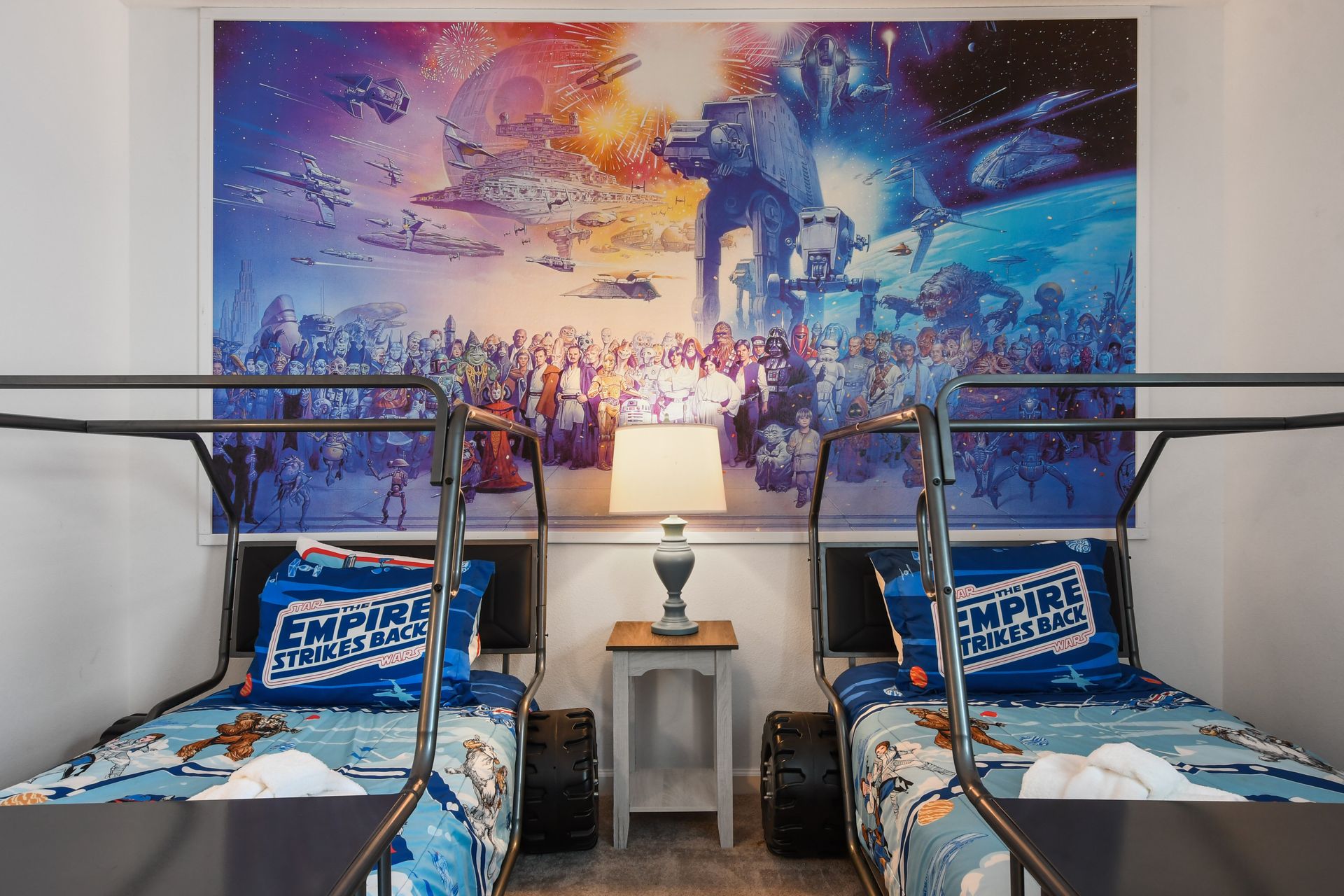 Epic galaxy-themed room with starfighter beds—perfect for young Jedi adventures!