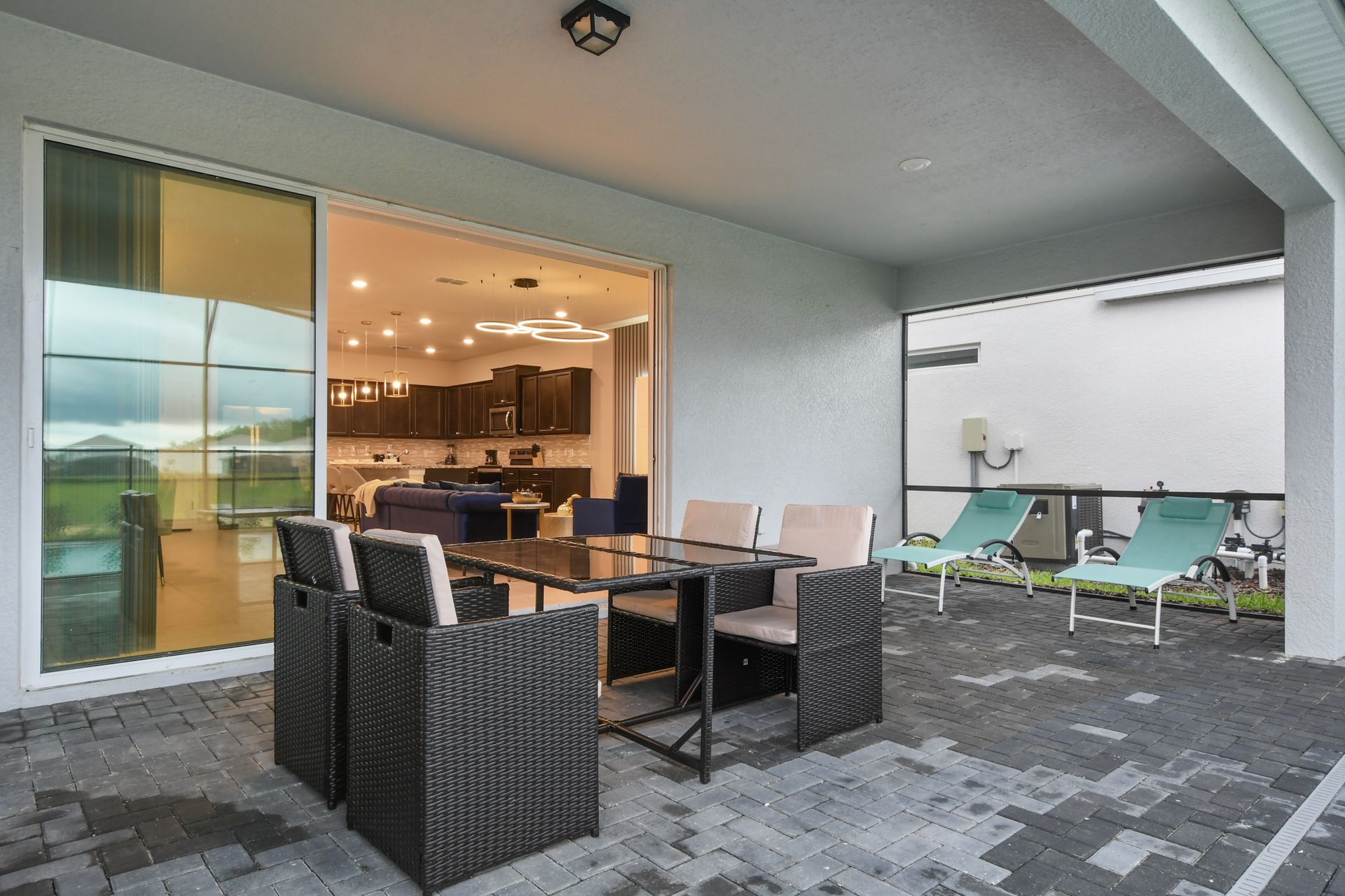 Indoor-outdoor living at its finest—dine al fresco just steps from the pool.