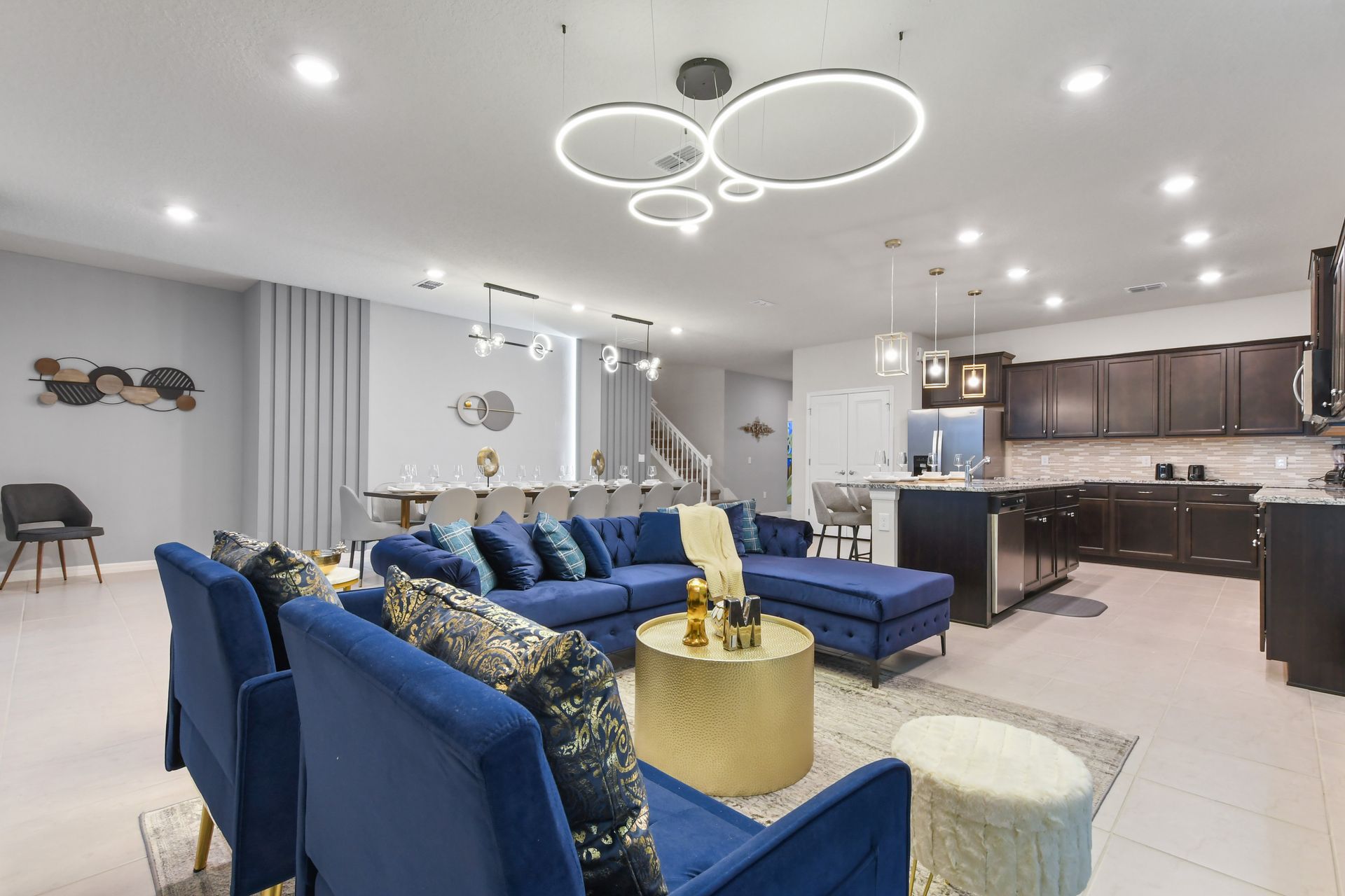 Expansive modern home, elegant dining, sleek kitchen, perfect for entertaining.