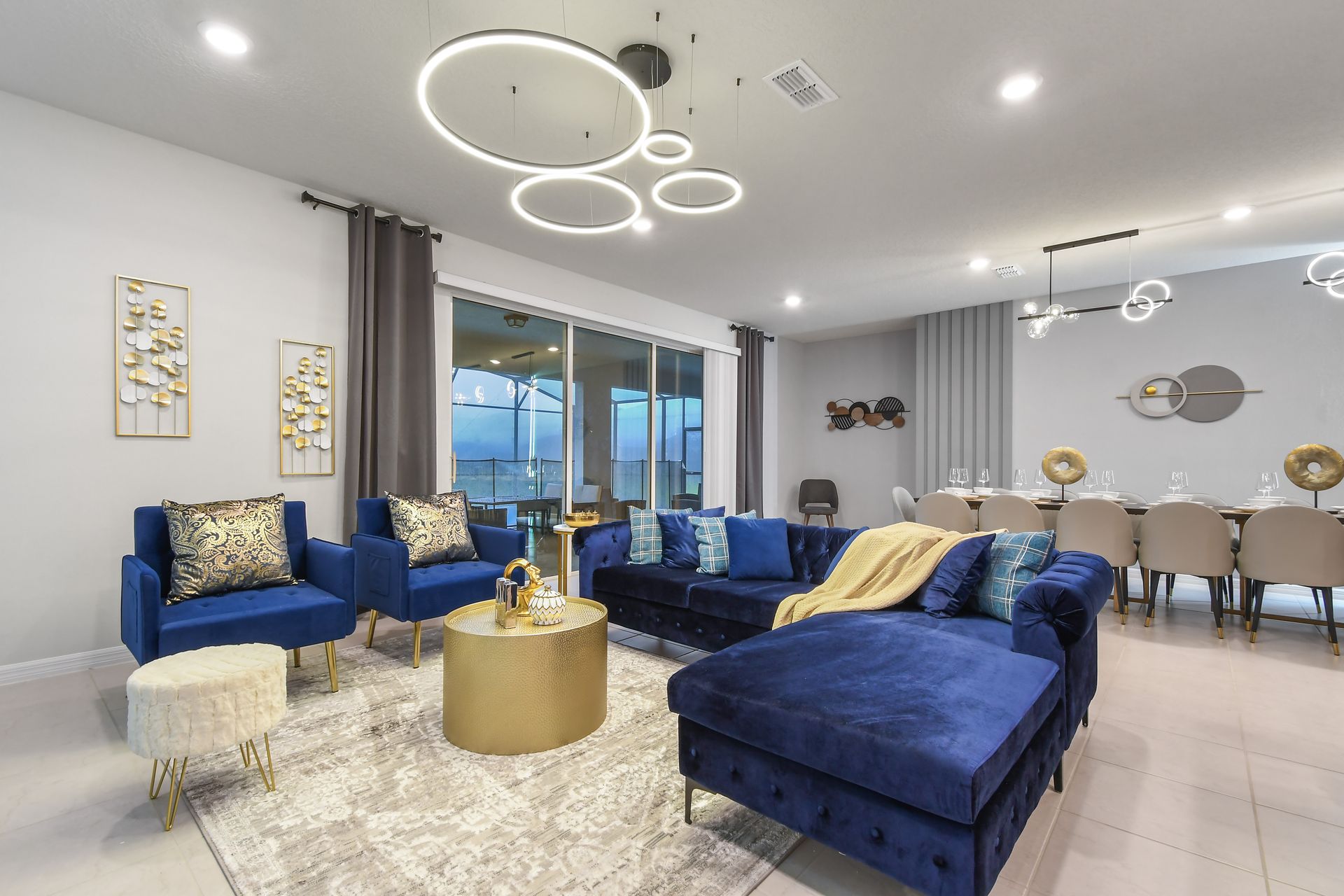 Luxurious open-space lounge and dining area, stylishly designed for gatherings.