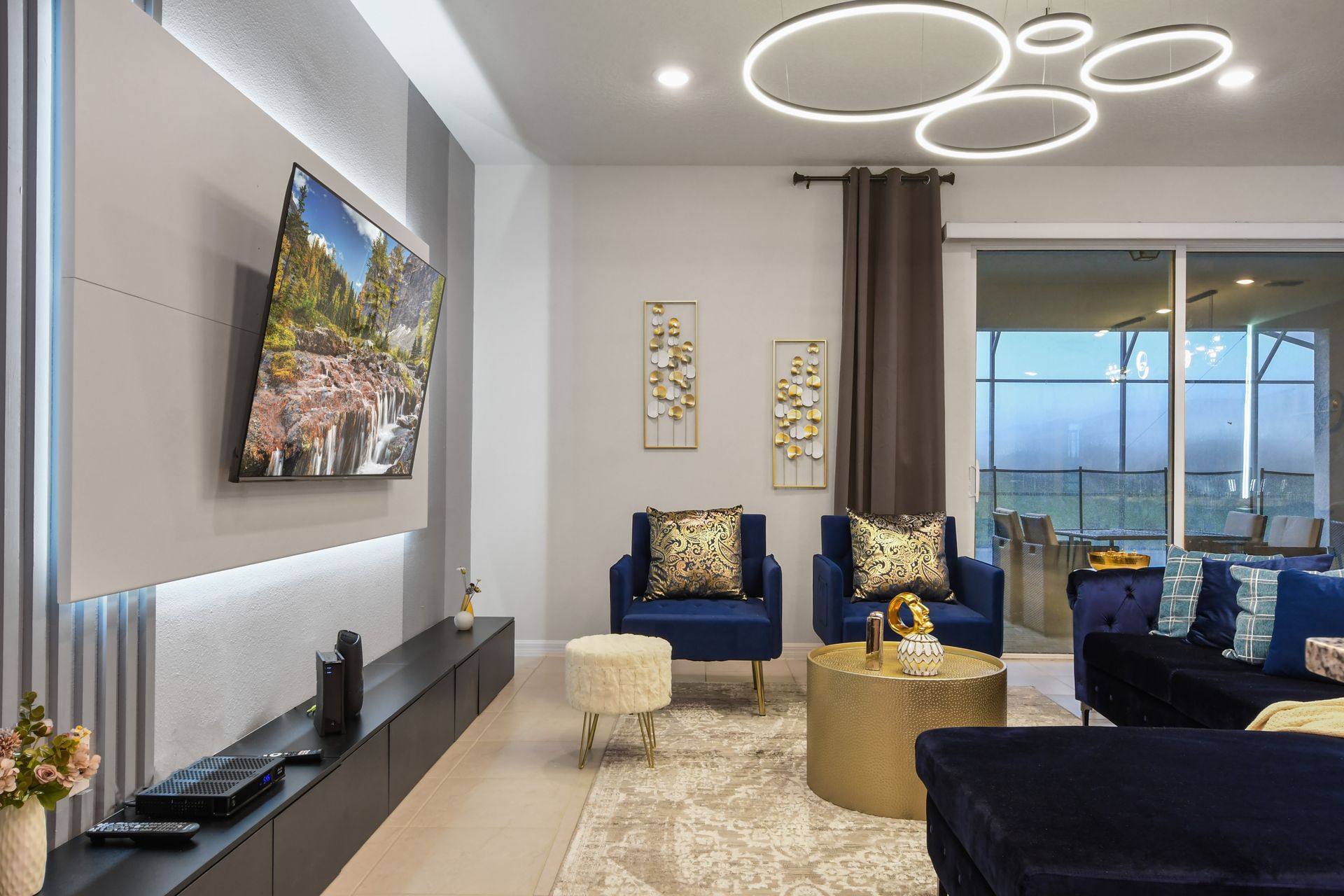 Elegant lounge area, modern accents, comfy seating, perfect for family gatherings.