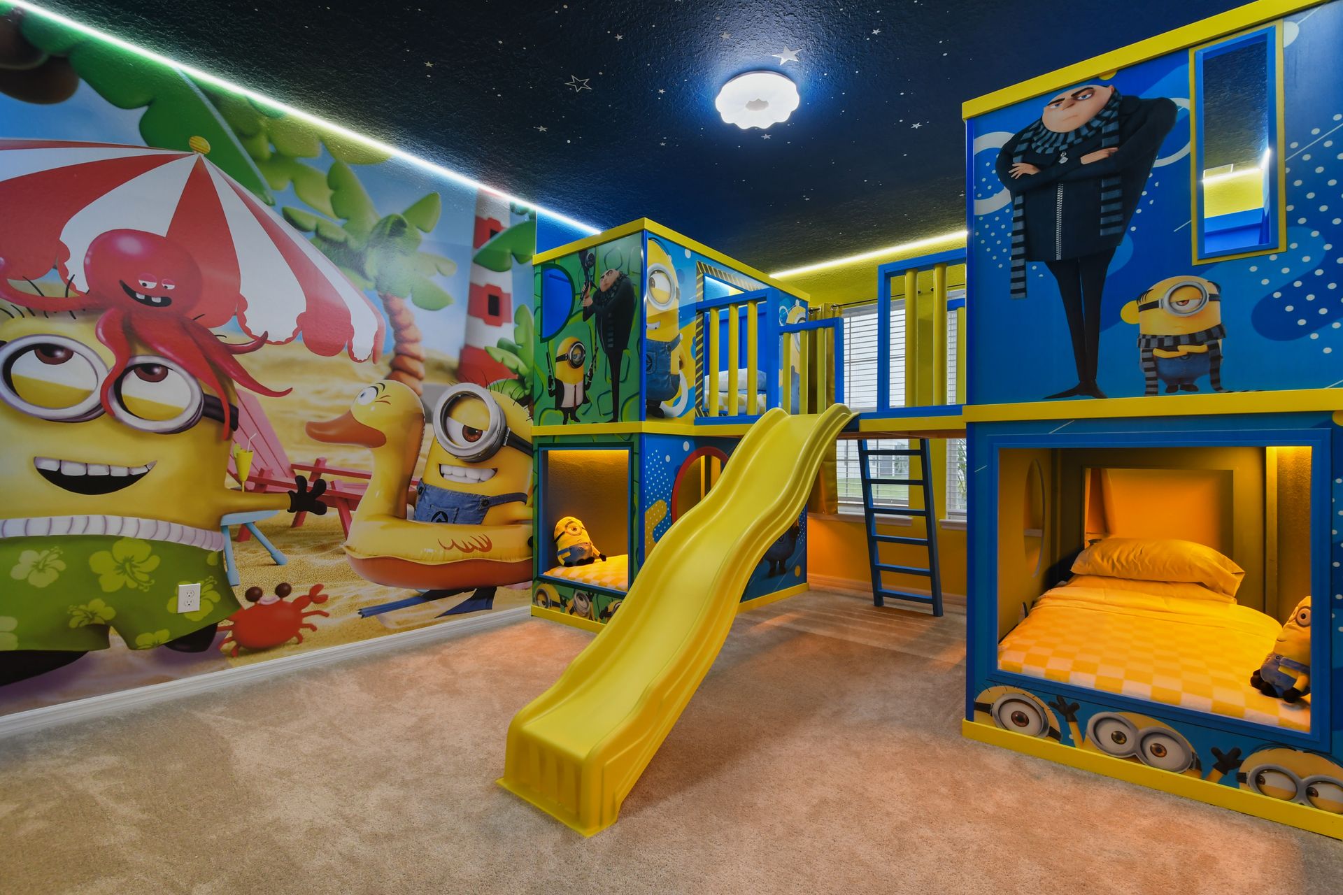 Minion-themed bunk room with slides, murals, and built-in beds for nonstop fun.