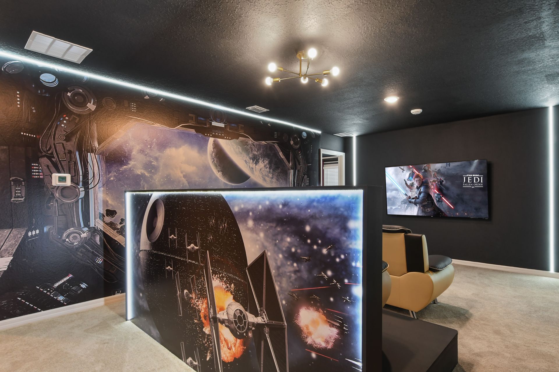 Star Wars-themed theater room with LED accents and cozy seating for epic movie nights.