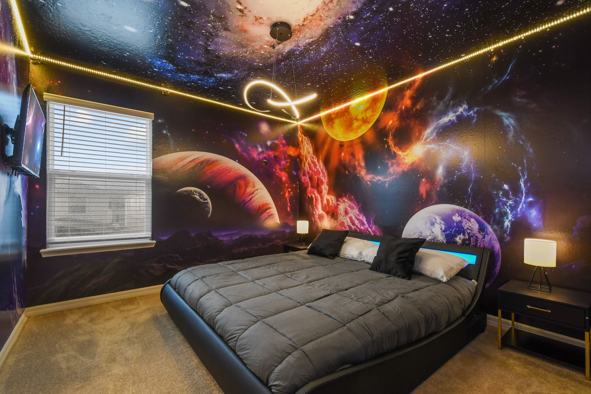 Sleep among the stars in this stunning galaxy-themed bedroom escape.