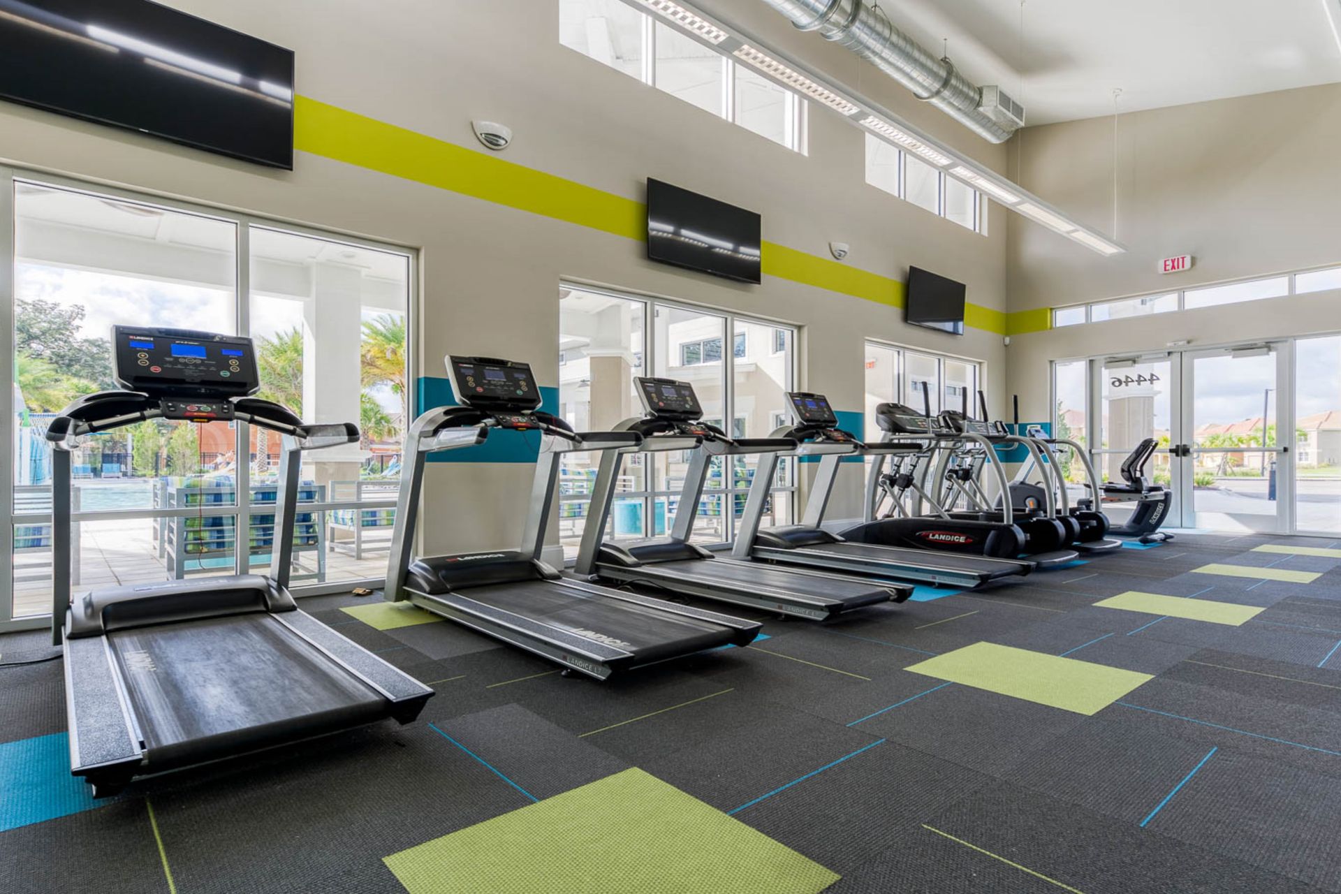 Stay active in a modern fitness center with top equipment and poolside views