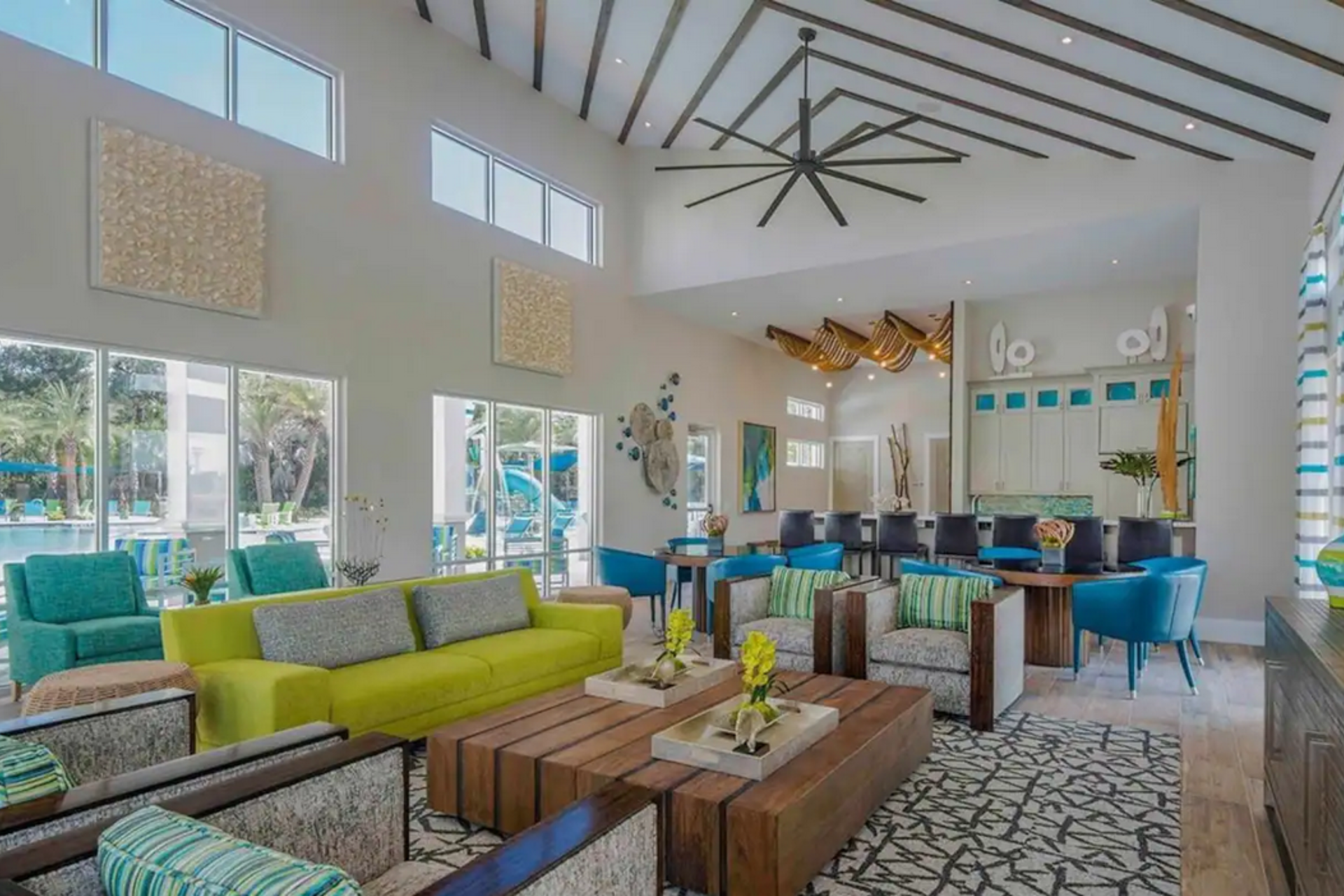 Stylish clubhouse with modern decor, cozy seating, and poolside views for relaxation