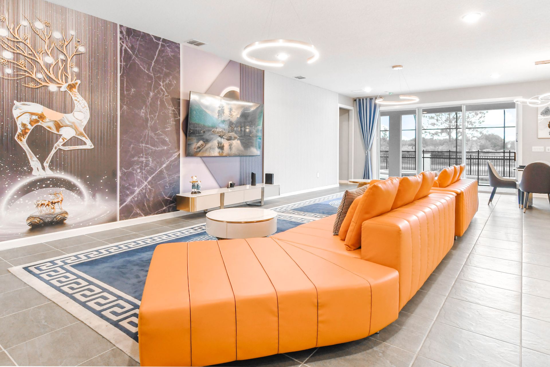 Enjoy quality time with loved ones in our inviting living room, offering a cozy space for relaxation.