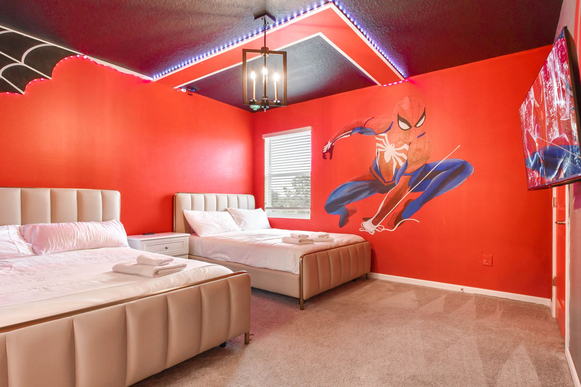 Experience luxury and comfort in our spacious Spiderman themed bedroom, promising you a restful night's sleep.