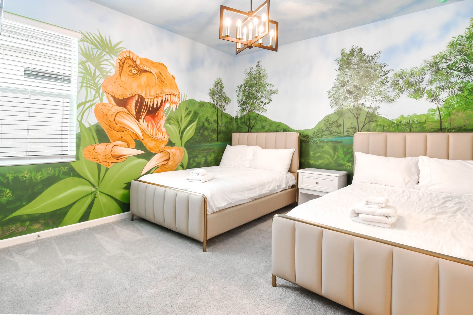 Relax in style in our cozy dinosaur safari bedroom, providing you with a comfortable retreat after a day of adventure.