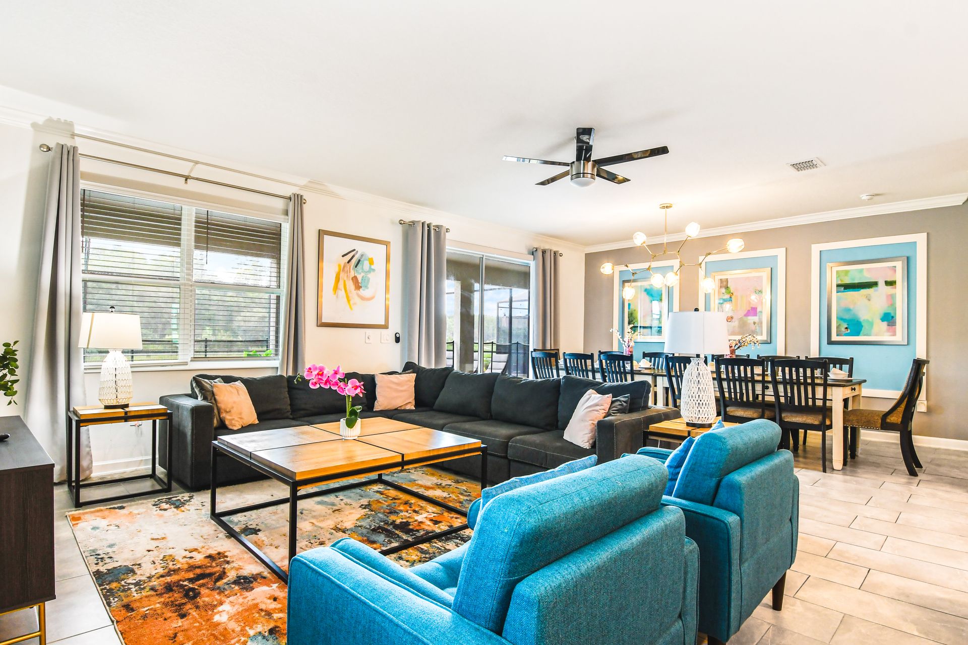 Spacious open-concept living & dining area with vibrant decor and ample seating.