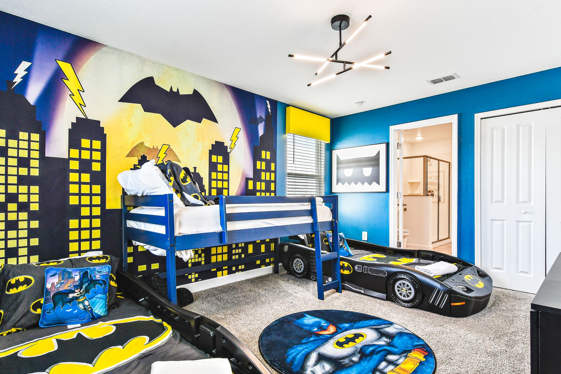 Welcome to Gotham City! This Batman-themed bedroom is perfect for little heroes.