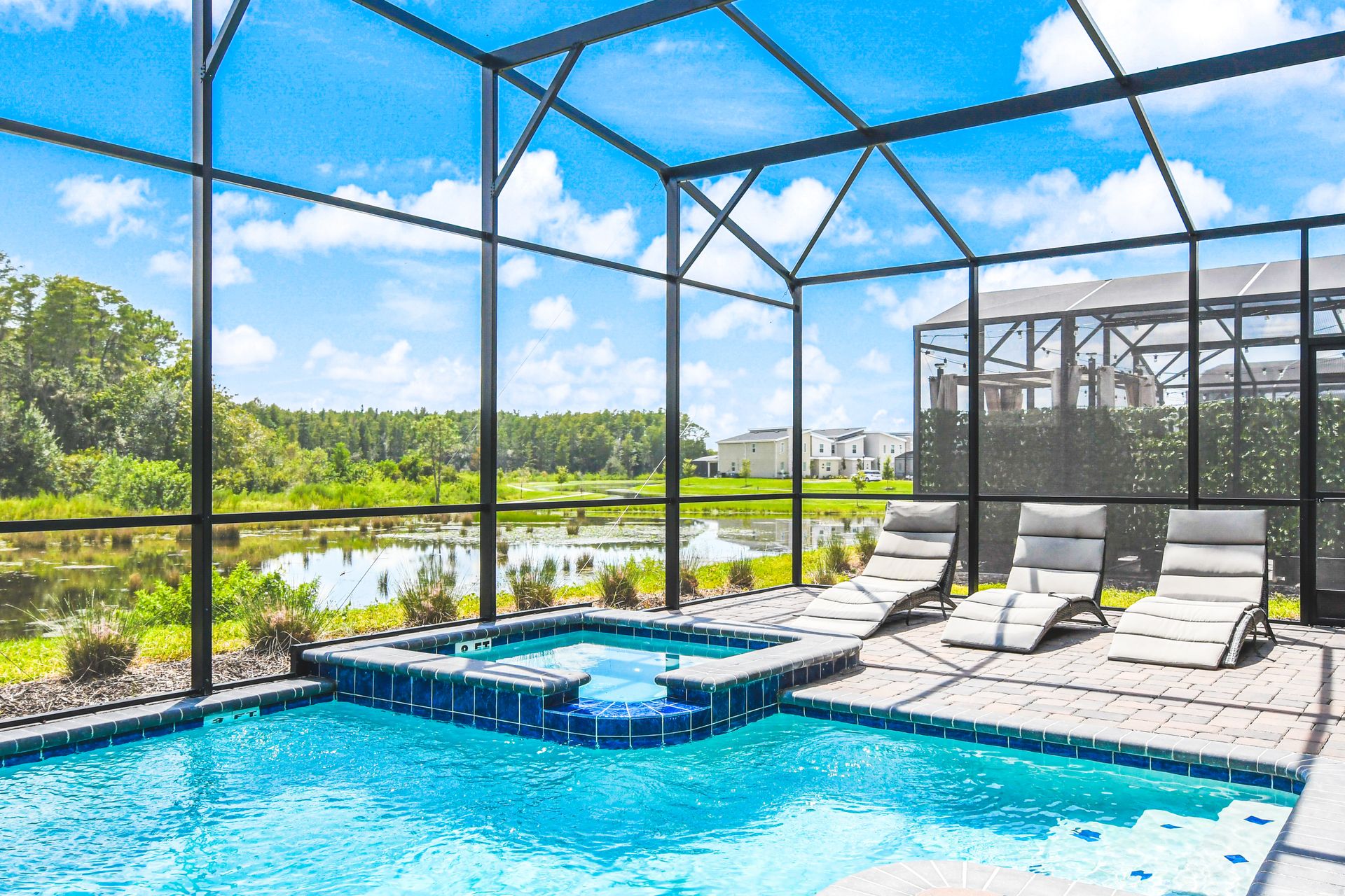Unwind by the pool and spa with serene pond views—your private oasis awaits!